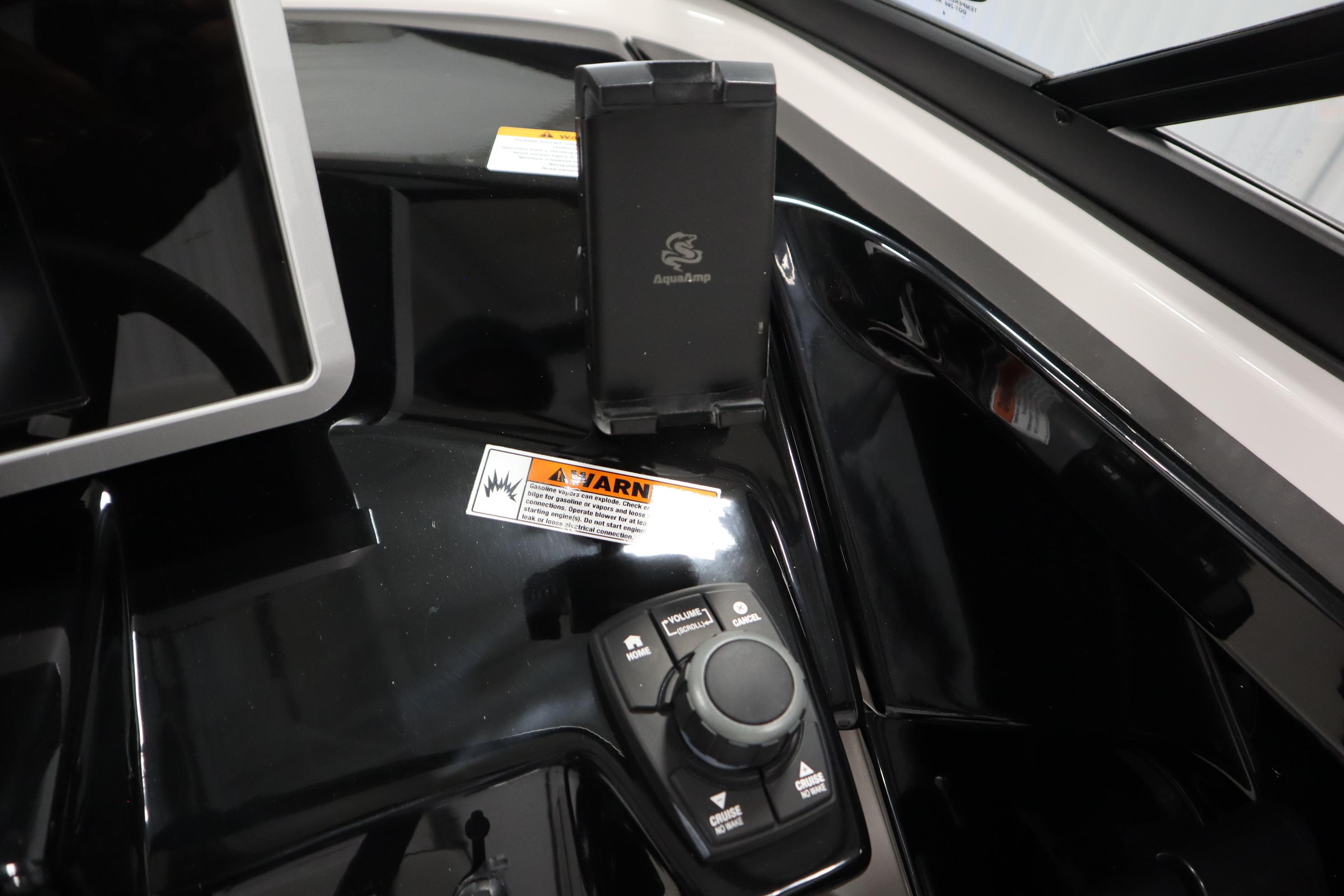 2026 Yamaha AR250 boat dashboard with control panel and phone holder.