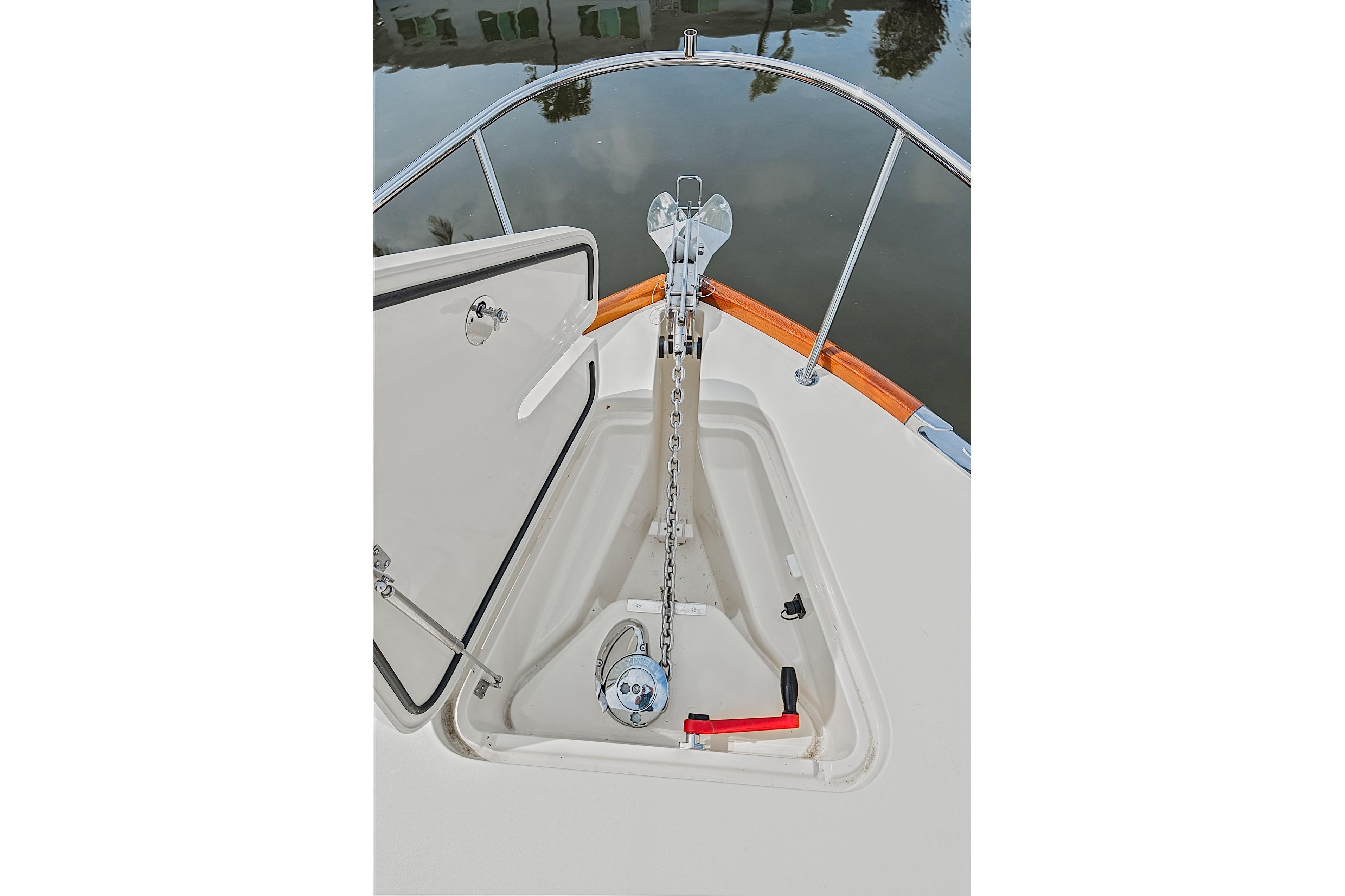 Anchor compartment of 2018 Hinckley Picnic Boat 37 MKIII, featuring chain and storage.