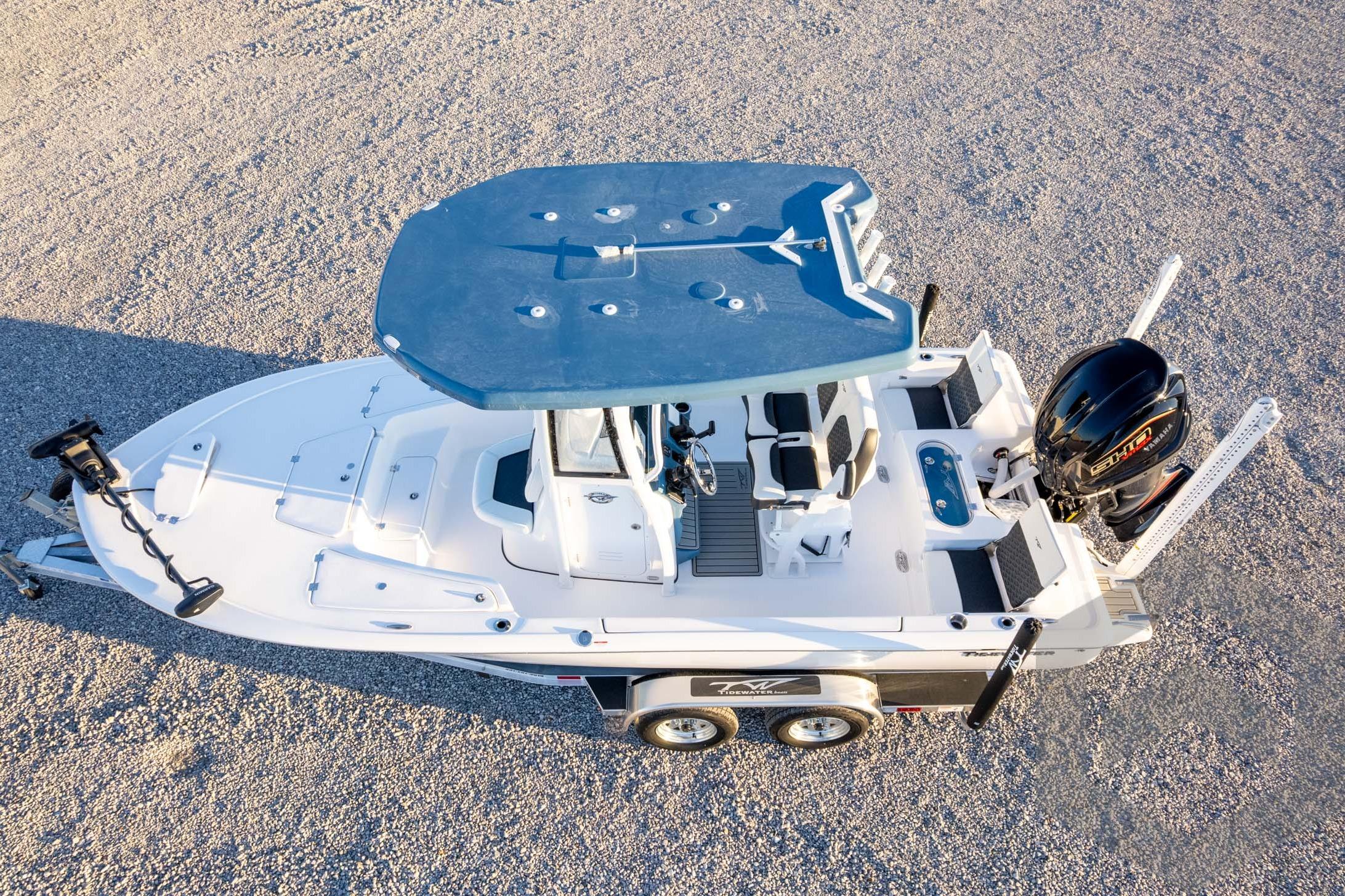 2026 Tidewater 2110 Bay Max boat on trailer, aerial view, gravel background.