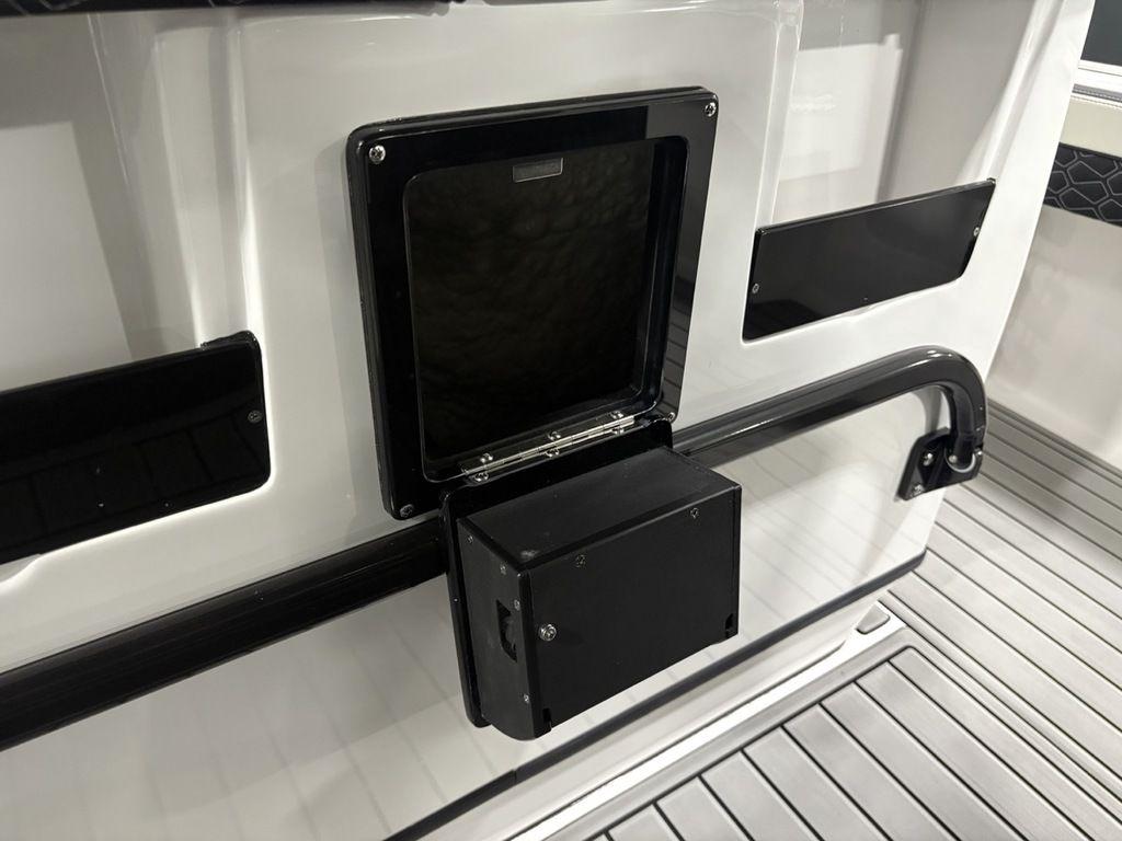 2026 Tidewater 2700 CB boat interior with sleek black and white design elements.