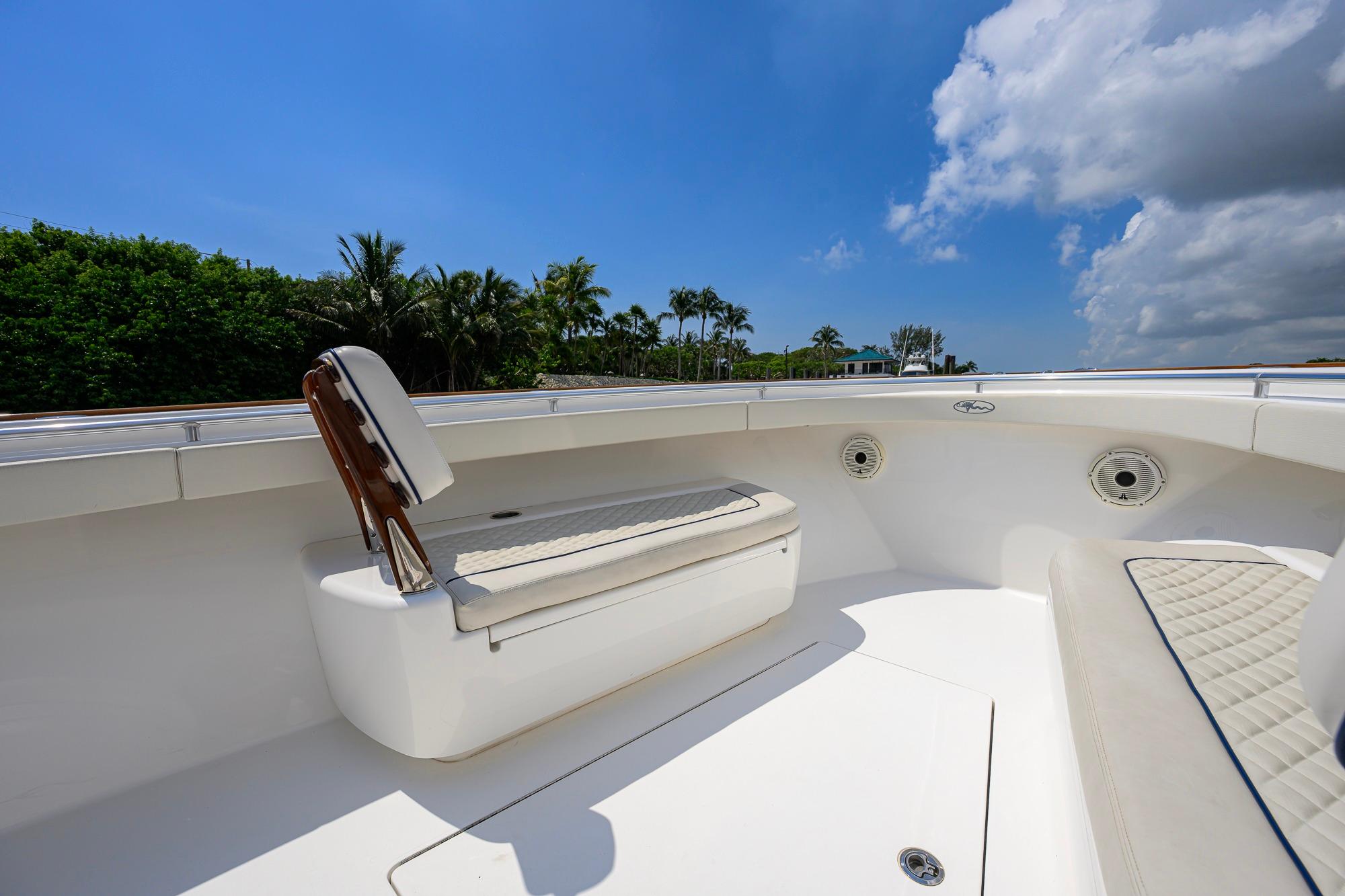 2020 Valhalla Boatworks V-41 interior with seating, under a clear blue sky.