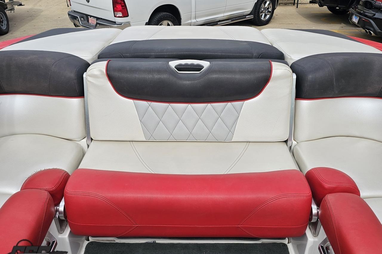 2013 MasterCraft X-10 boat interior with red, white, and black seating.
