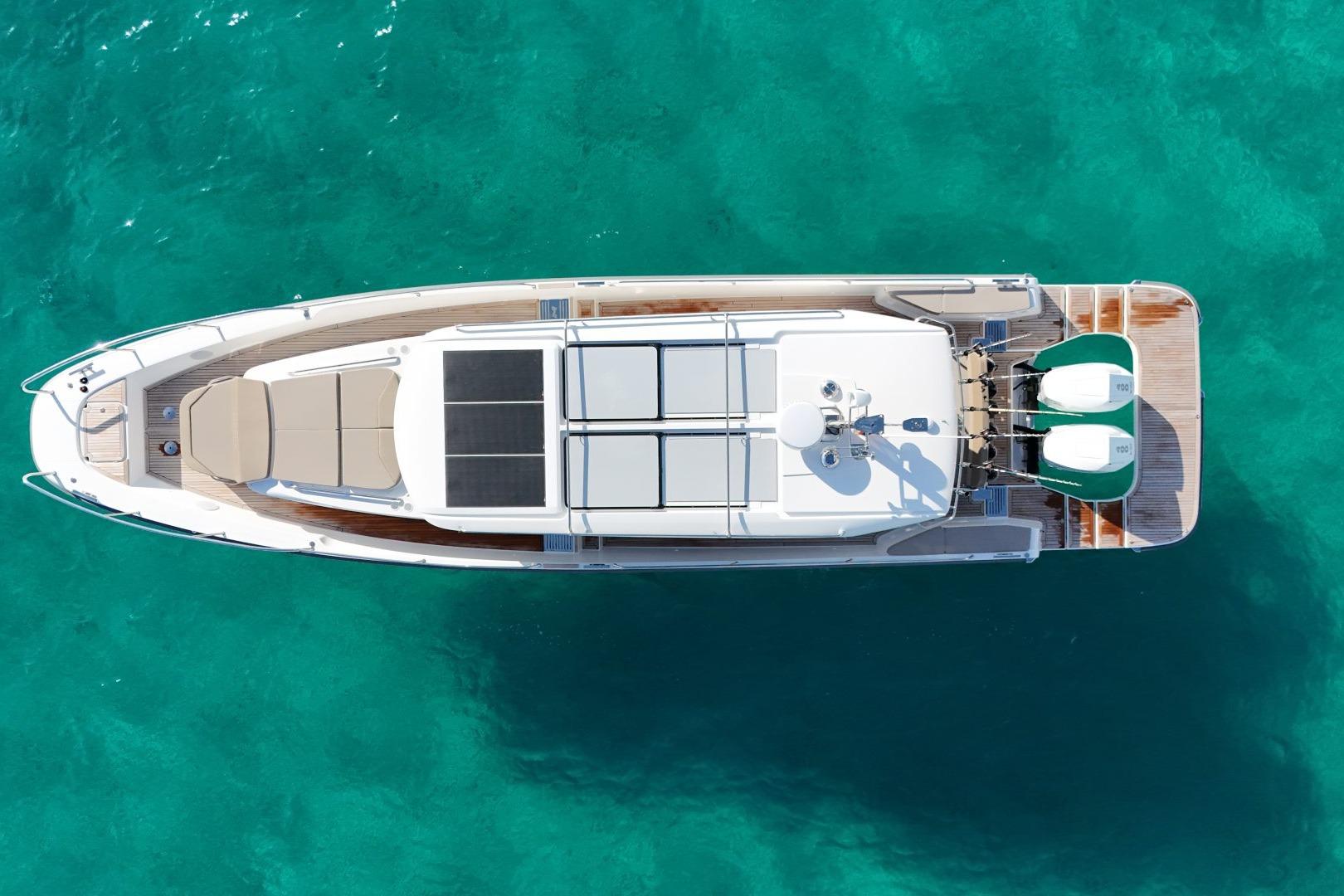 Nimbus Commuter 11 2025 on turquoise water, aerial view.