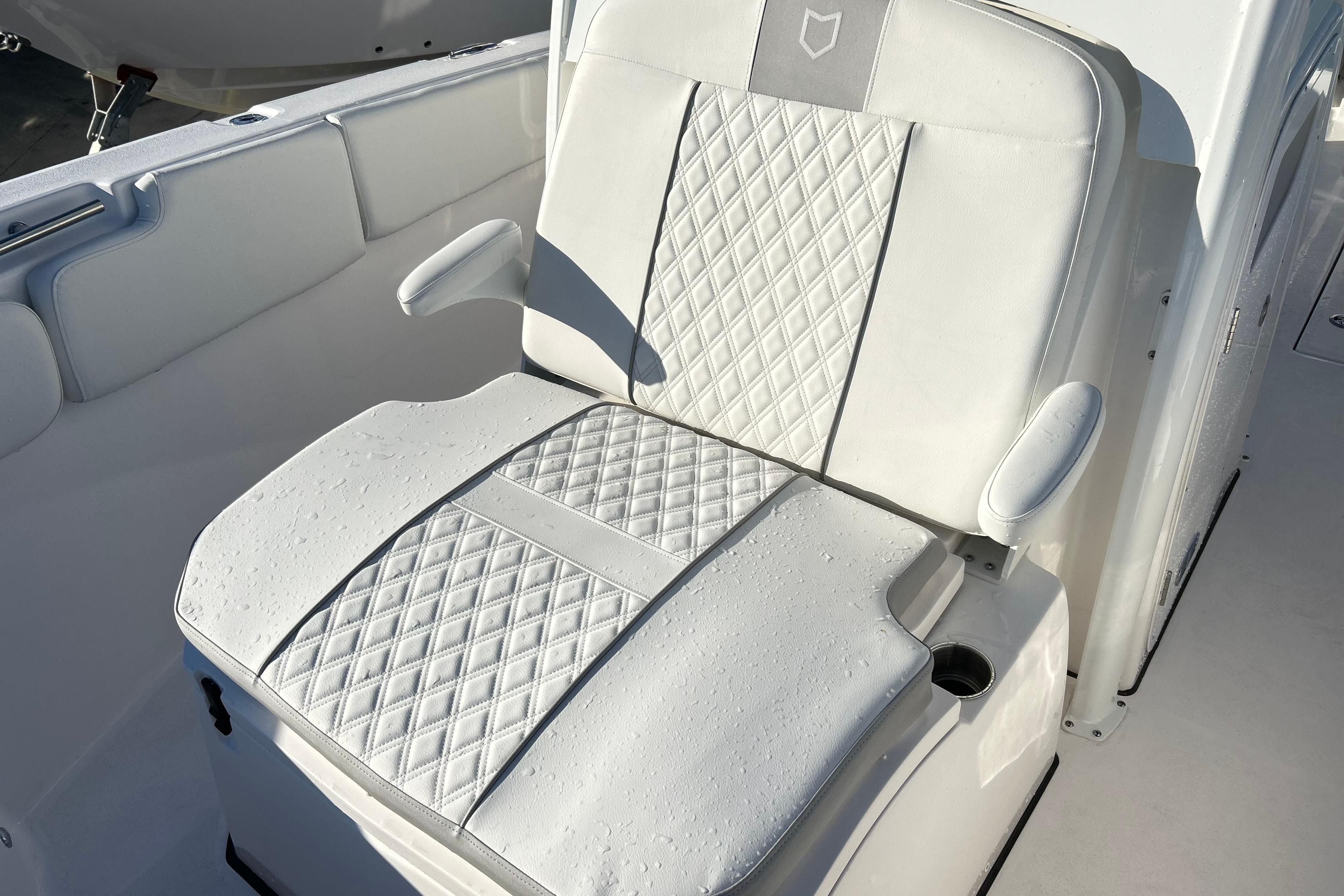 Luxurious seating on 2026 Sea Fox 288 Commander boat, featuring diamond-stitched upholstery.