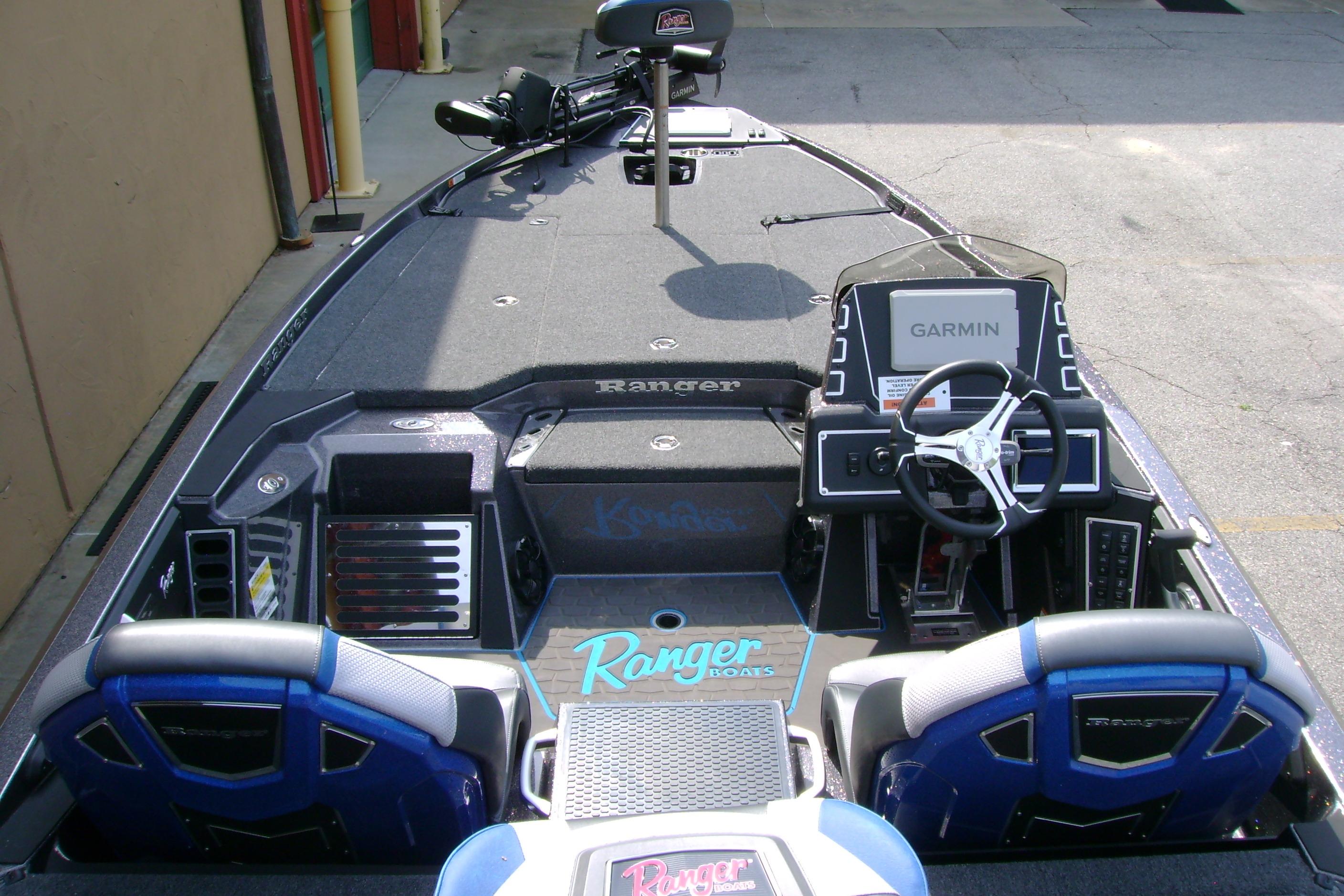 2026 Ranger Z519R Cup-Equipped boat interior with Garmin navigation system and dual seating.