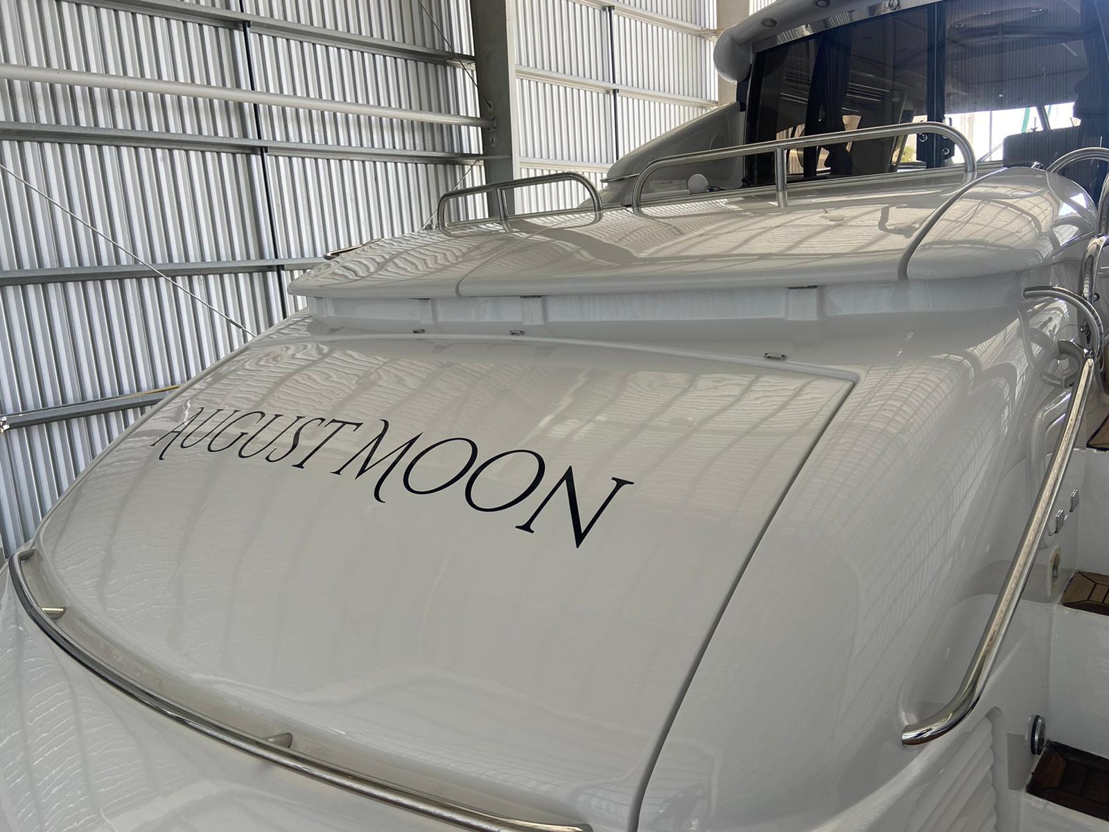 Sunseeker Predator 80 yacht, 2000 model, named "August Moon" in a storage facility.