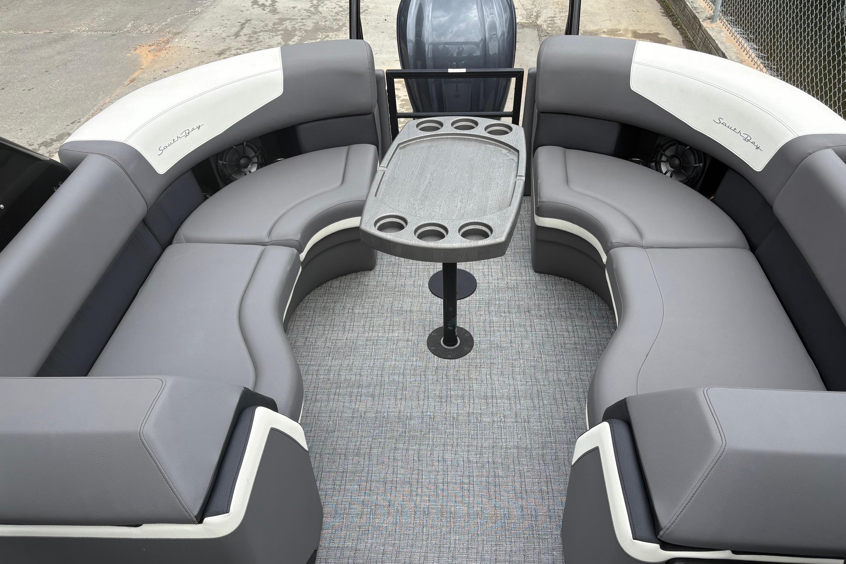 Luxurious seating area on 2023 South Bay 525 RS 3.0 Arch pontoon boat.