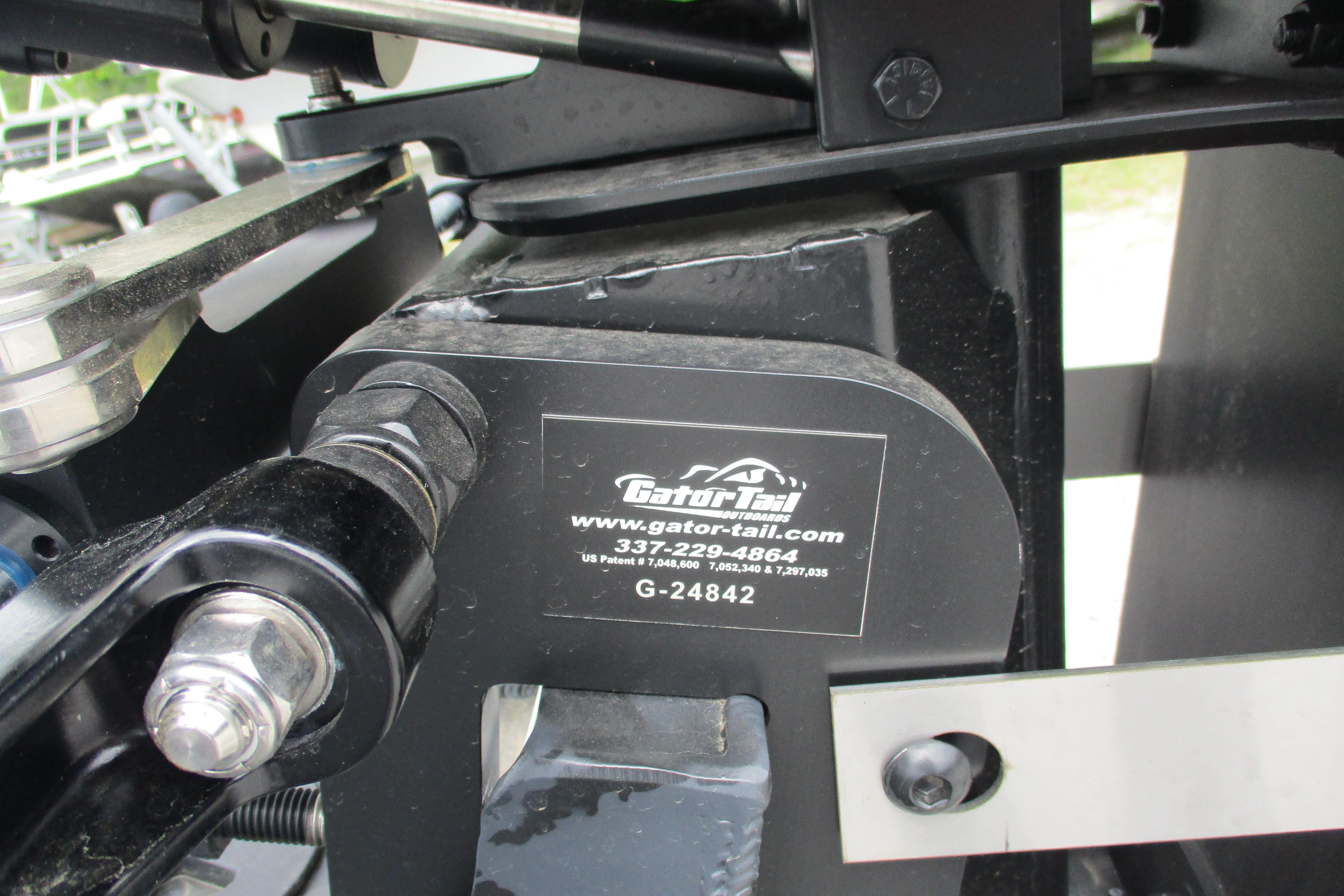 Close-up of Gator Tail 1860 Extreme CC 2026 boat component with branding and contact details.