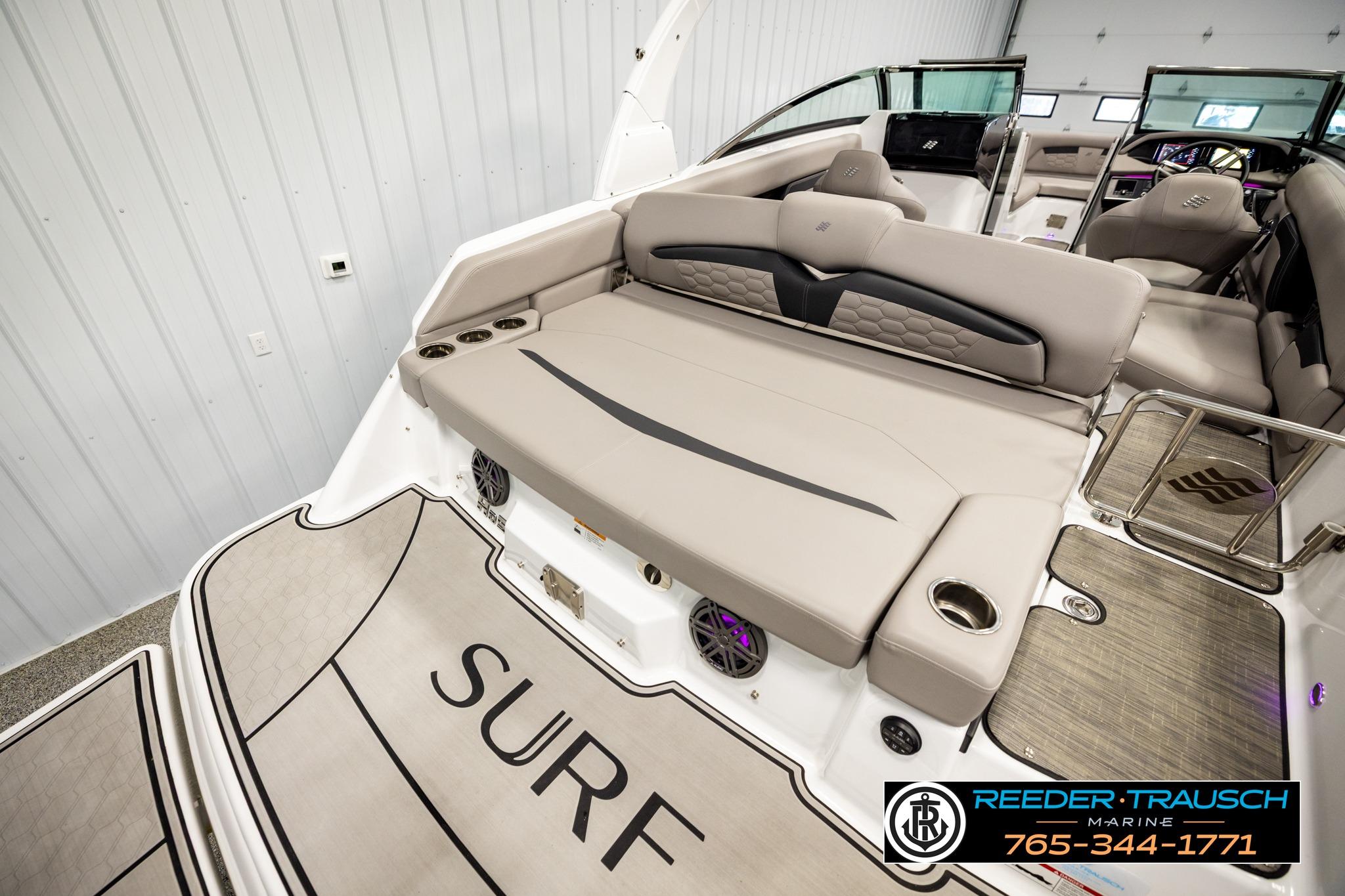2024 FOURWINNS HD5 Surf boat interior with luxurious seating and modern design.