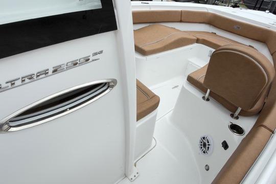 2026 Sea Hunt Ultra 255 SE boat interior with tan seating and sleek design.
