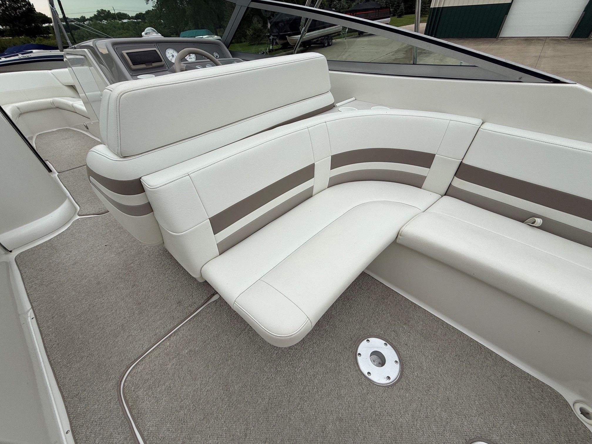Interior of a 1998 Formula Thunderbird boat with white seating.