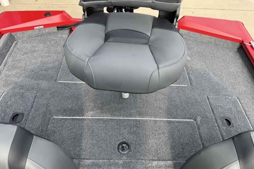 2026 Tracker Pro Team 175 boat interior with gray seating and carpeted deck.