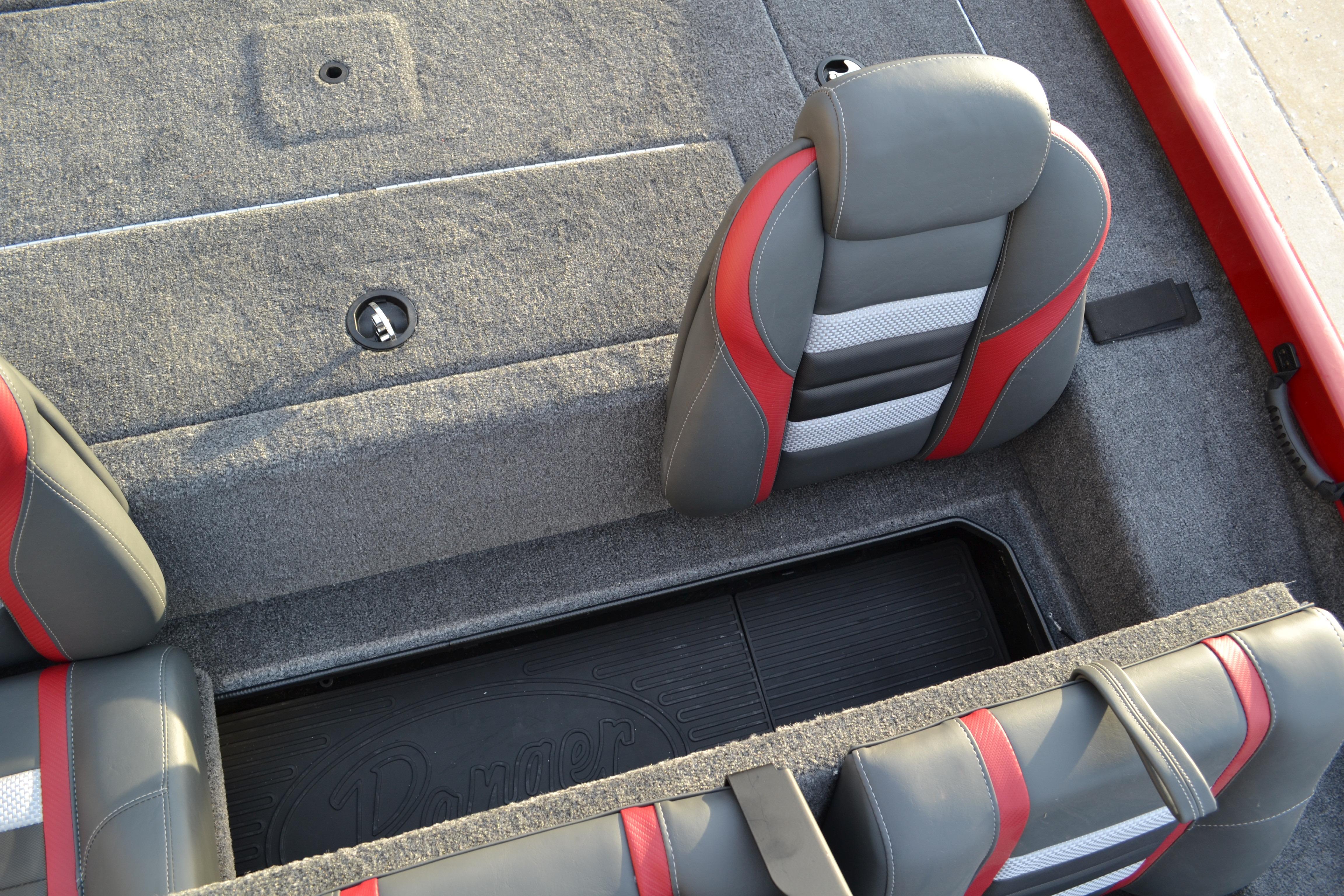 2026 Ranger RT188 boat interior with gray and red seating and carpeted flooring.
