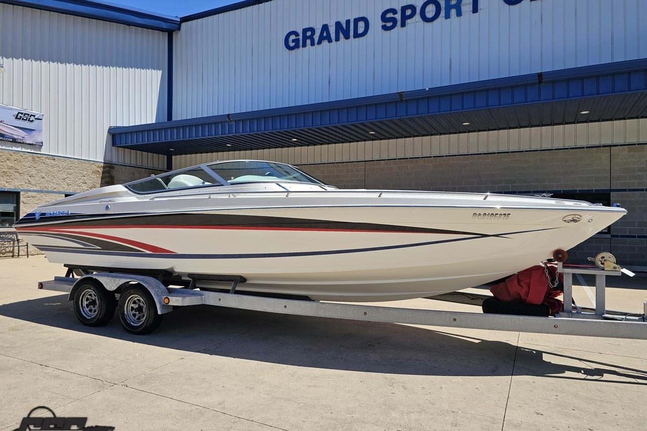 2005 Formula 271 FASTech boat on trailer outside Grand Sport Center.