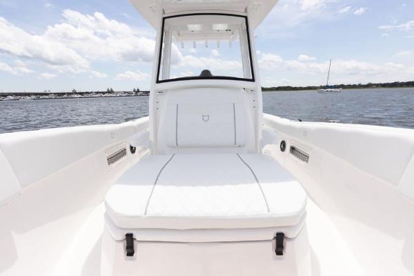 Manufacturer Provided Image: 2025 Sea Fox 268 Commander boat interior with white seating, on calm water.