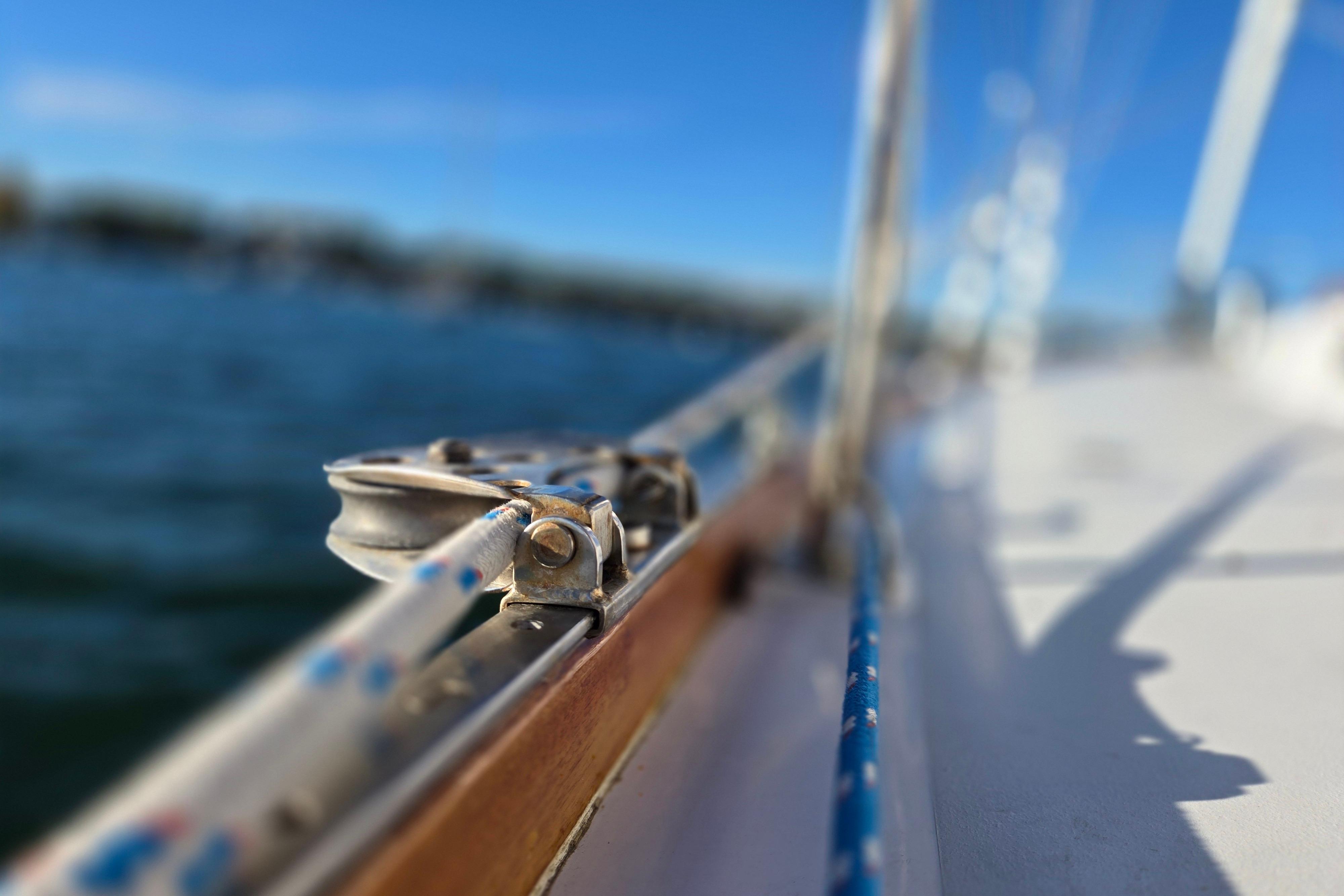 Close-up of a 1970 Hinckley Bermuda 40 sailboat deck with rigging details.