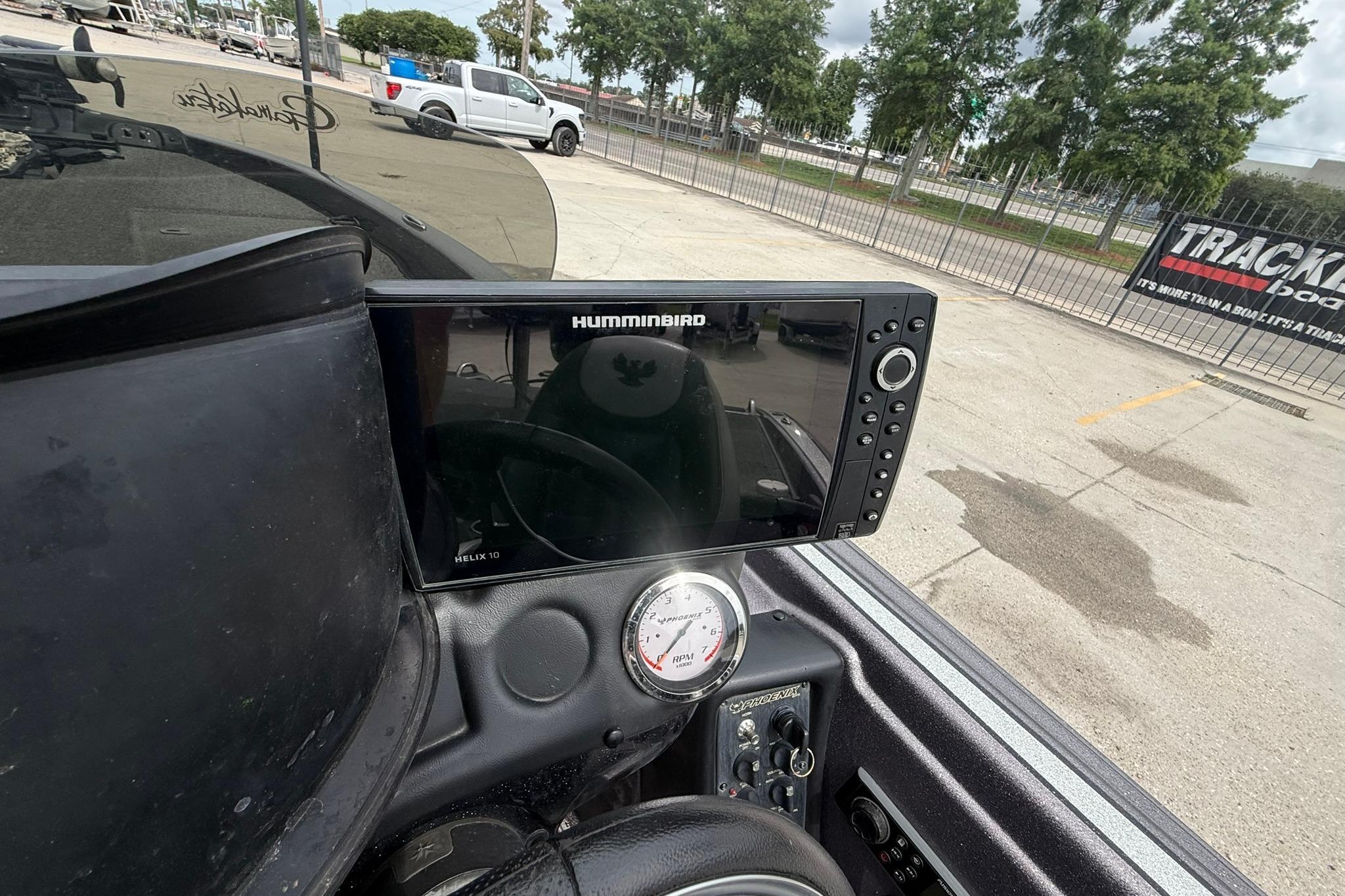 Dashboard of a 2018 Phoenix 919 ProXP with Humminbird Helix 10 display.
