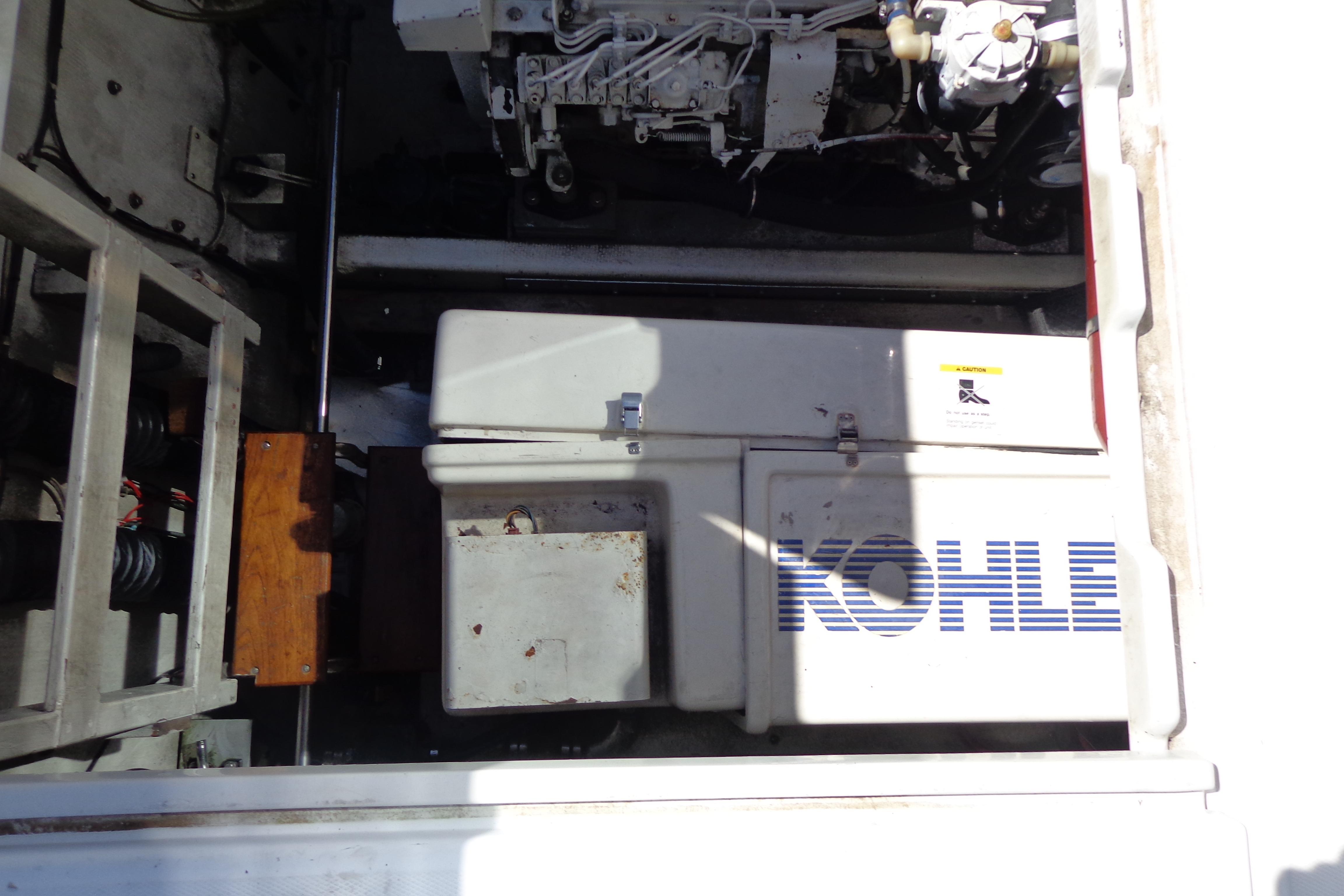 Engine compartment of a 1992 Cruise-A-Home Corsair 4200 with Kohler generator.