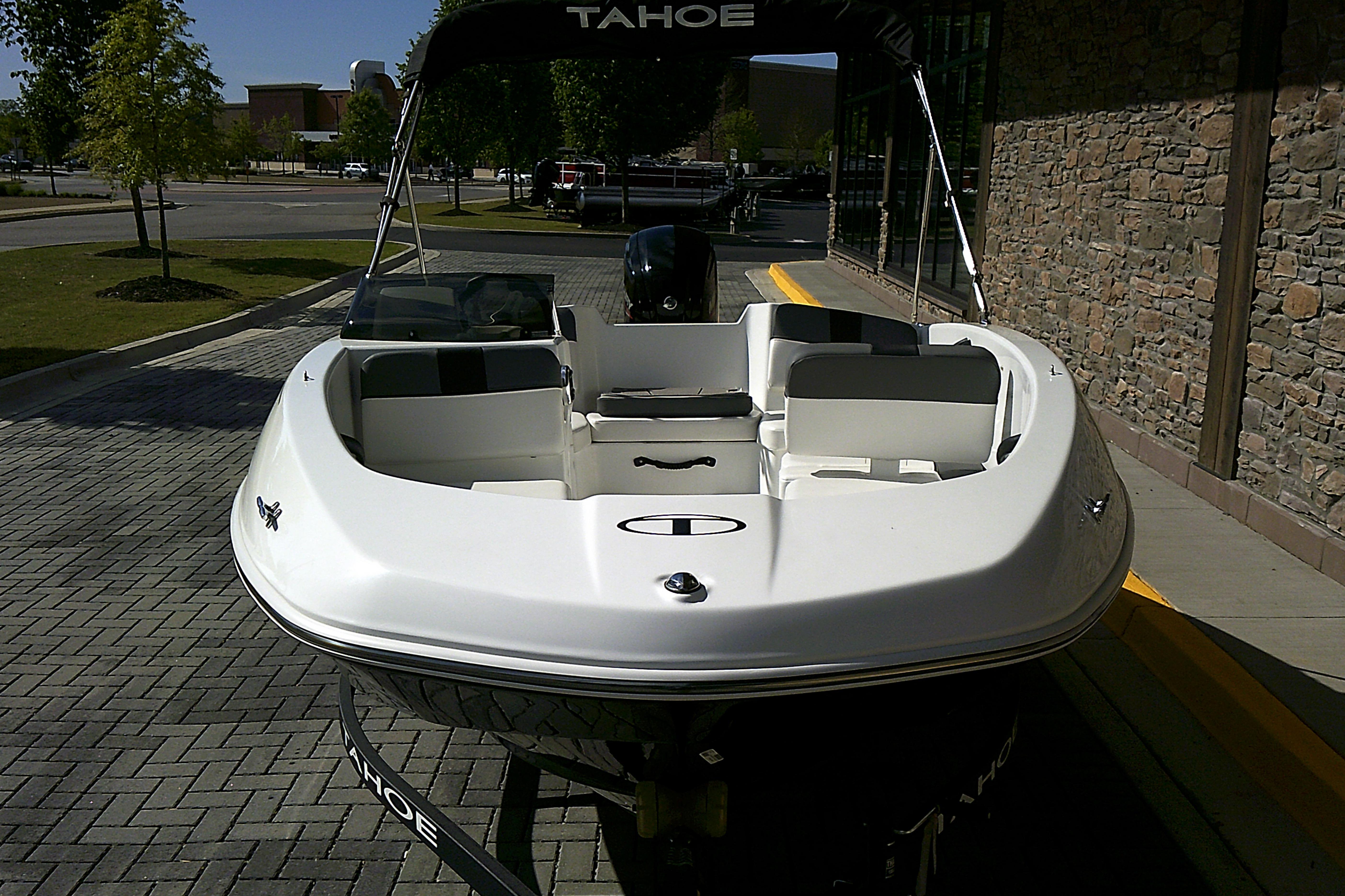 2025 Tahoe T16 boat displayed outdoors on a sunny day.
