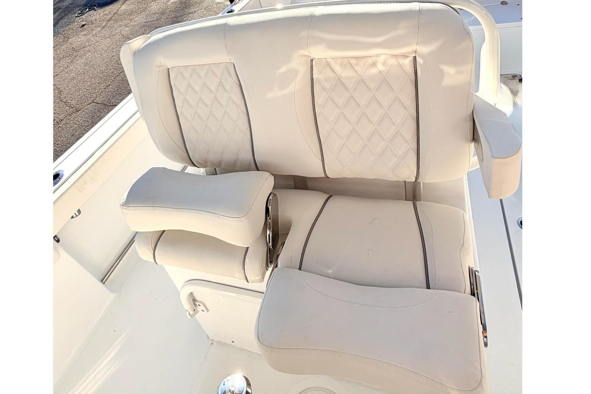 2026 Sea Hunt Ultra 275 Coffin Box boat with luxurious seating and dual engines.