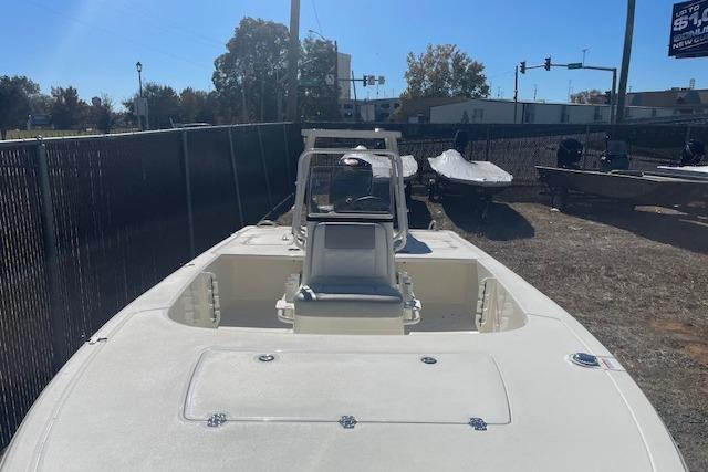 2026 Mako 18 Pro Skiff boat in outdoor storage, sunny day.