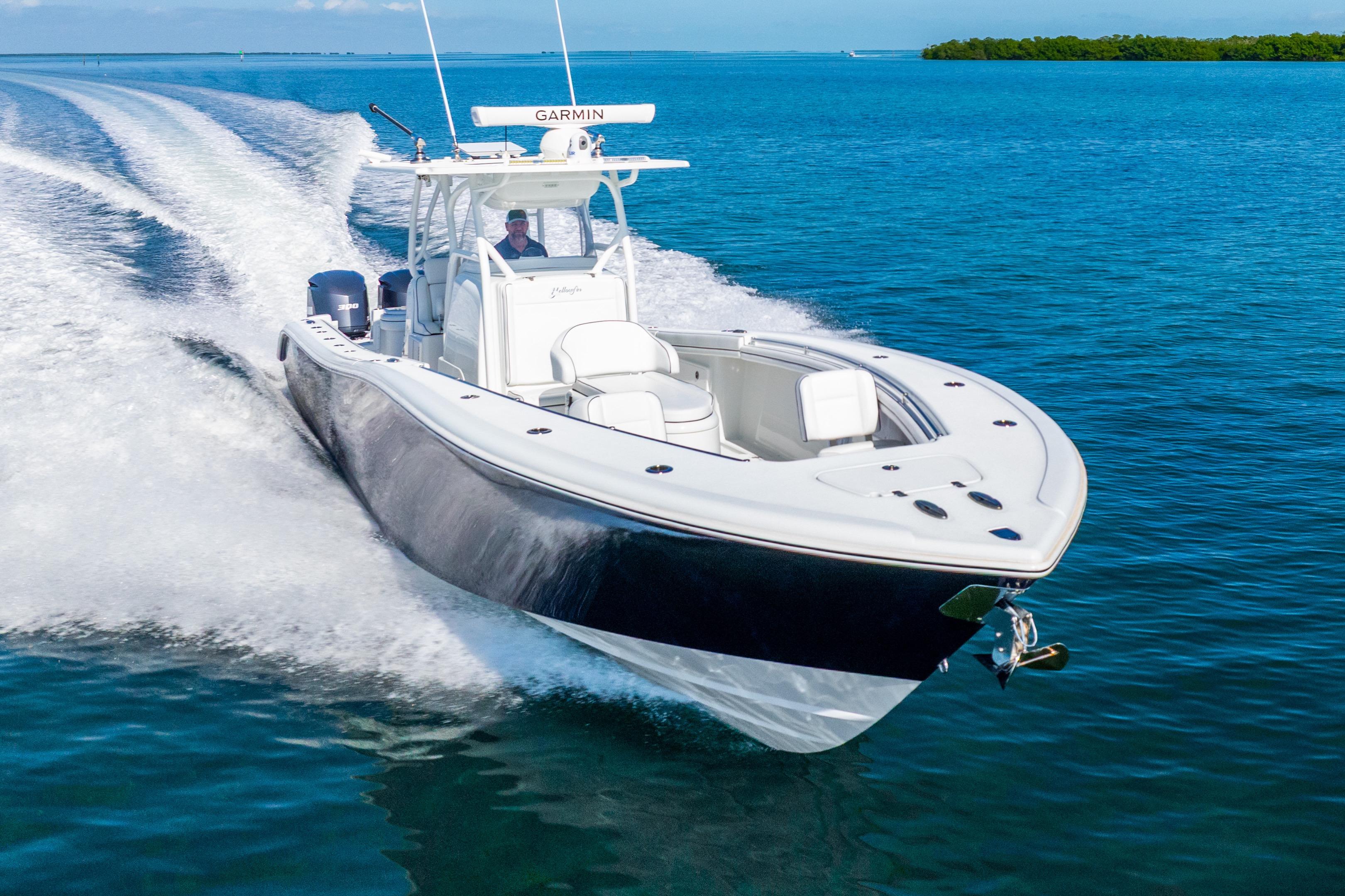 2016 Yellowfin 36 Offshore boat cruising on clear blue water.