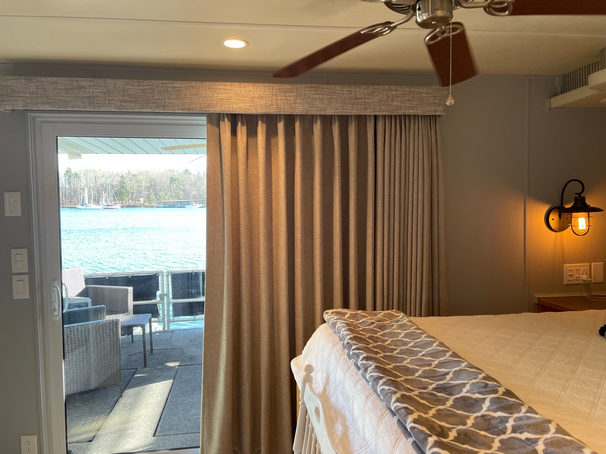 Interior of a 2001 Sumerset houseboat with lake view.