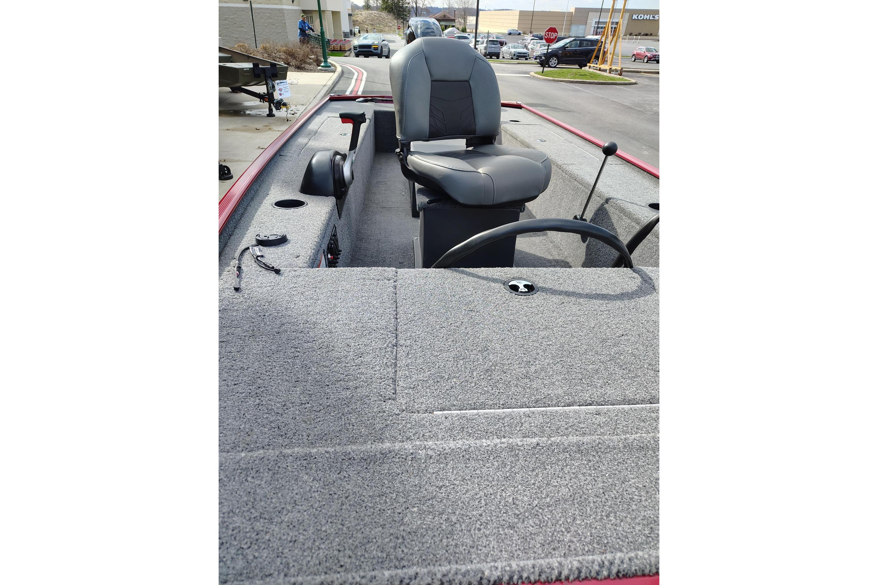 2025 Tracker Panfish 17 boat interior with seating and steering wheel.
