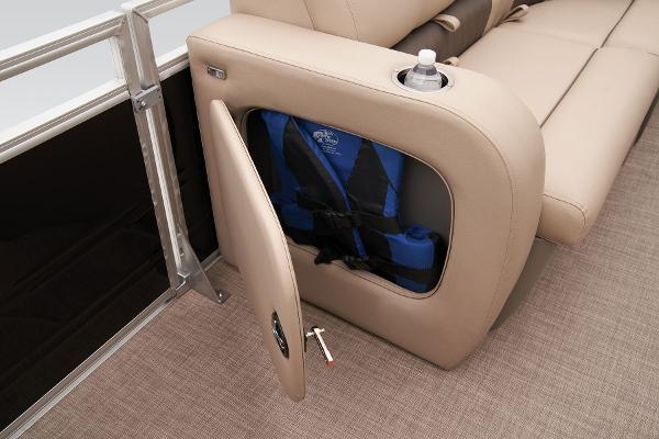 2024 Sun Tracker SportFish 22 DLX storage compartment with life jacket.