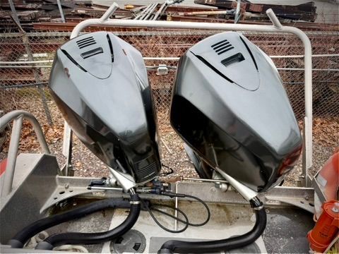 Two outboard motors on a 2004 SAFE Boats Defender.