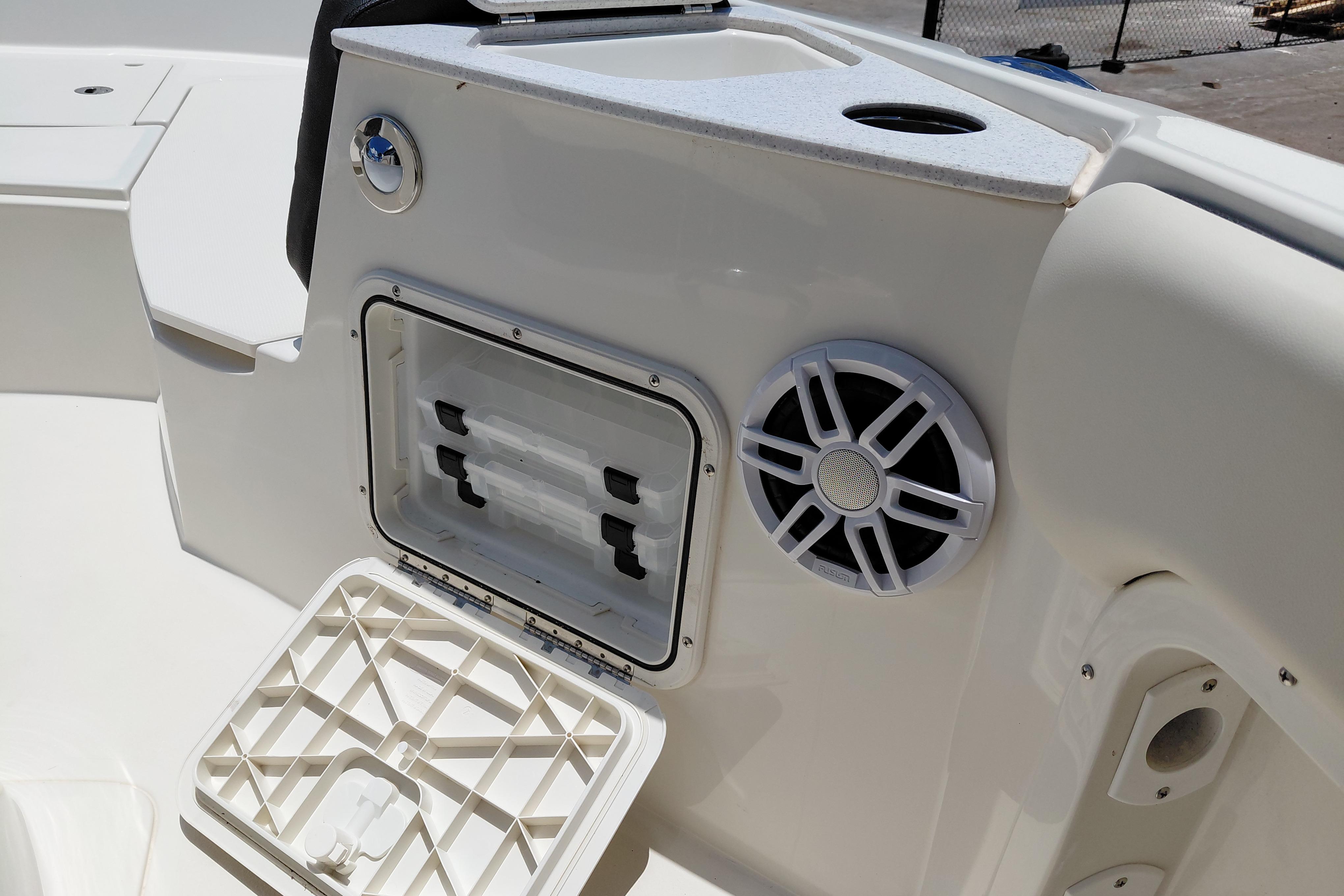 2023 Stingray 206 CC boat interior with storage compartment and speaker.