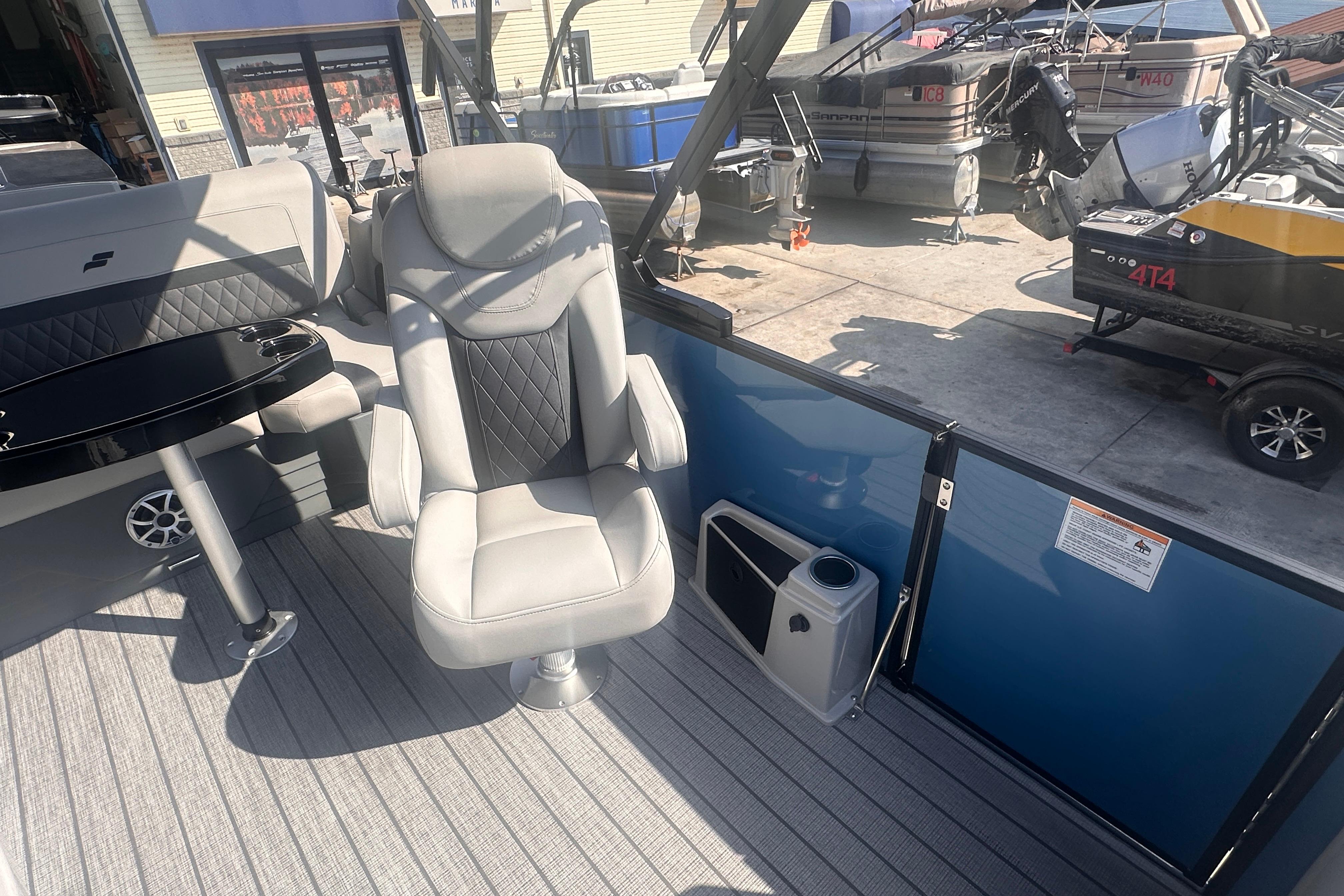 2026 Starcraft CX 23 DL BAR boat interior with plush seating and sleek design.