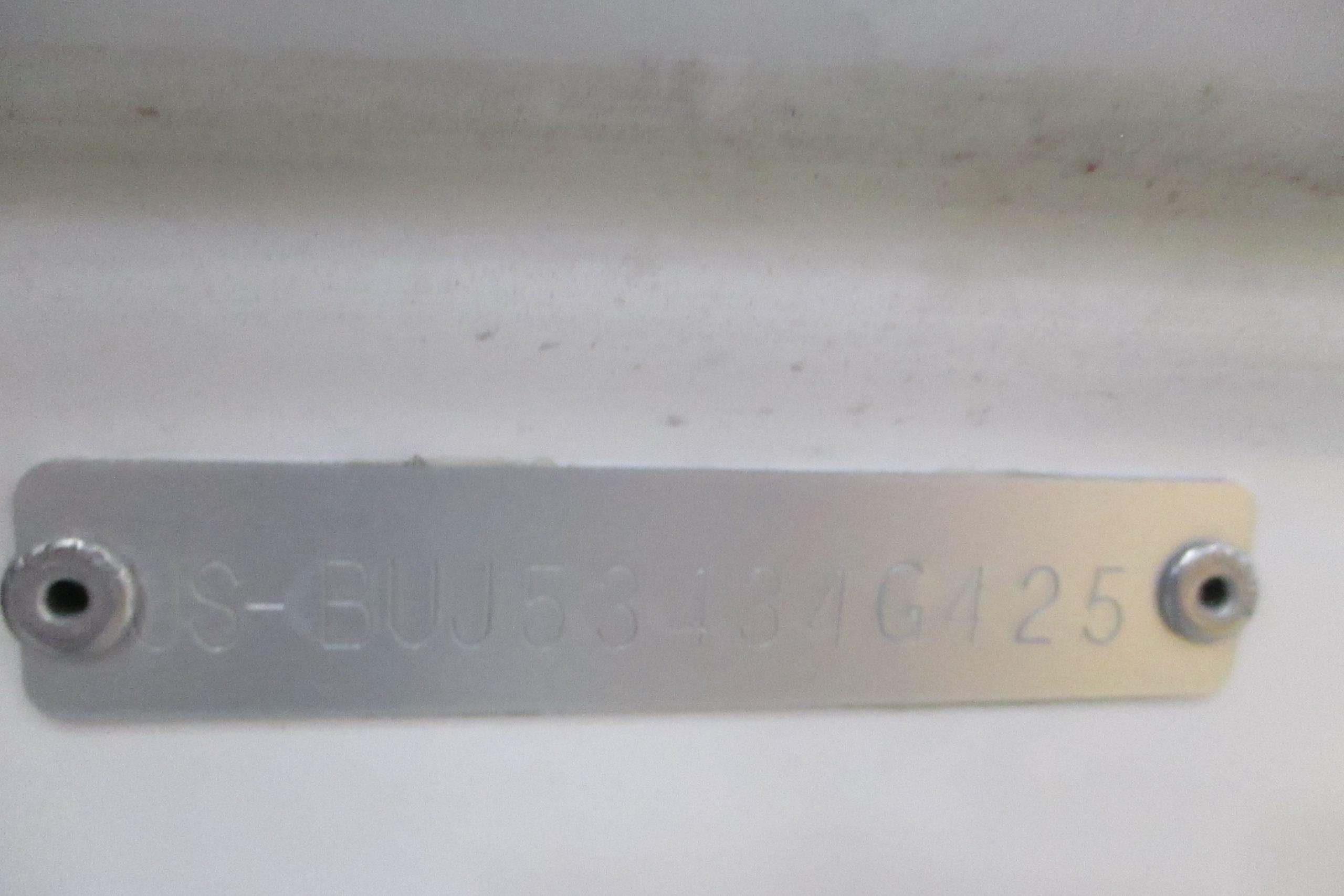 Metal identification plate on 2025 Tahoe T18 boat.