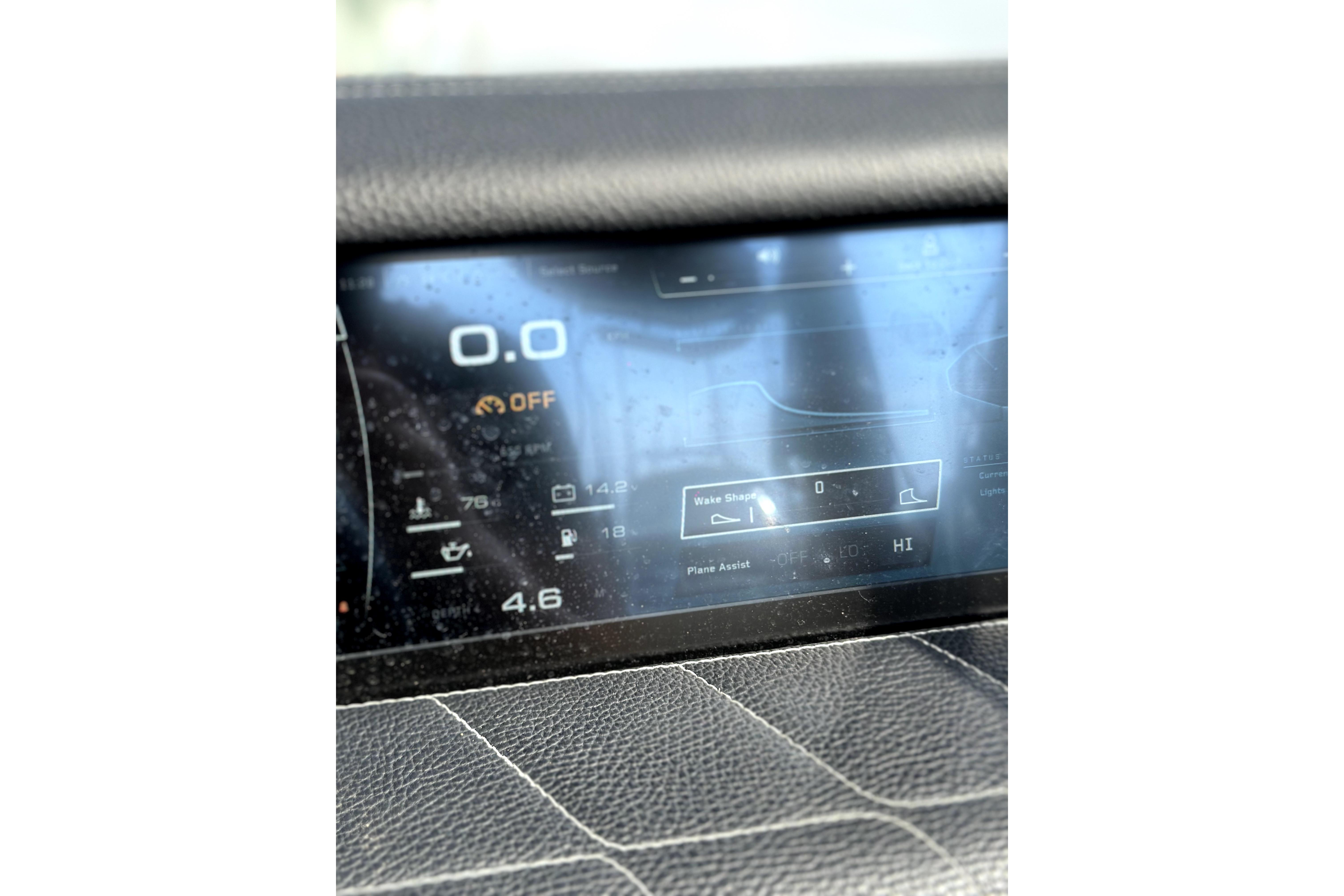 Dashboard display of 2022 Nautique Super Air Nautique G25 boat, showing controls and metrics.