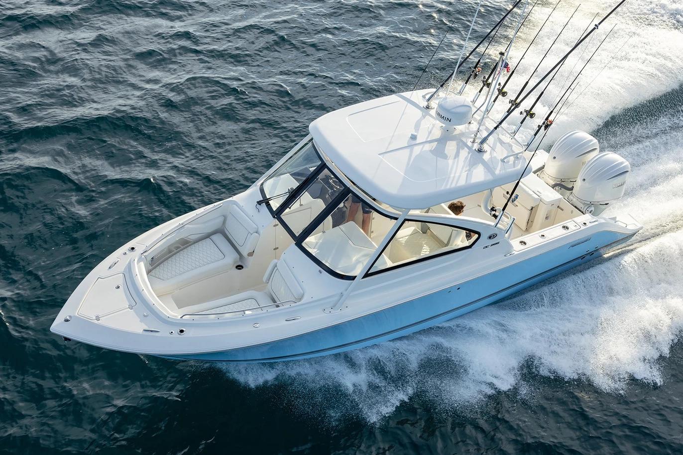 Manufacturer Provided Image: 2026 Pursuit DC 286 Dual Console boat cruising on open water.