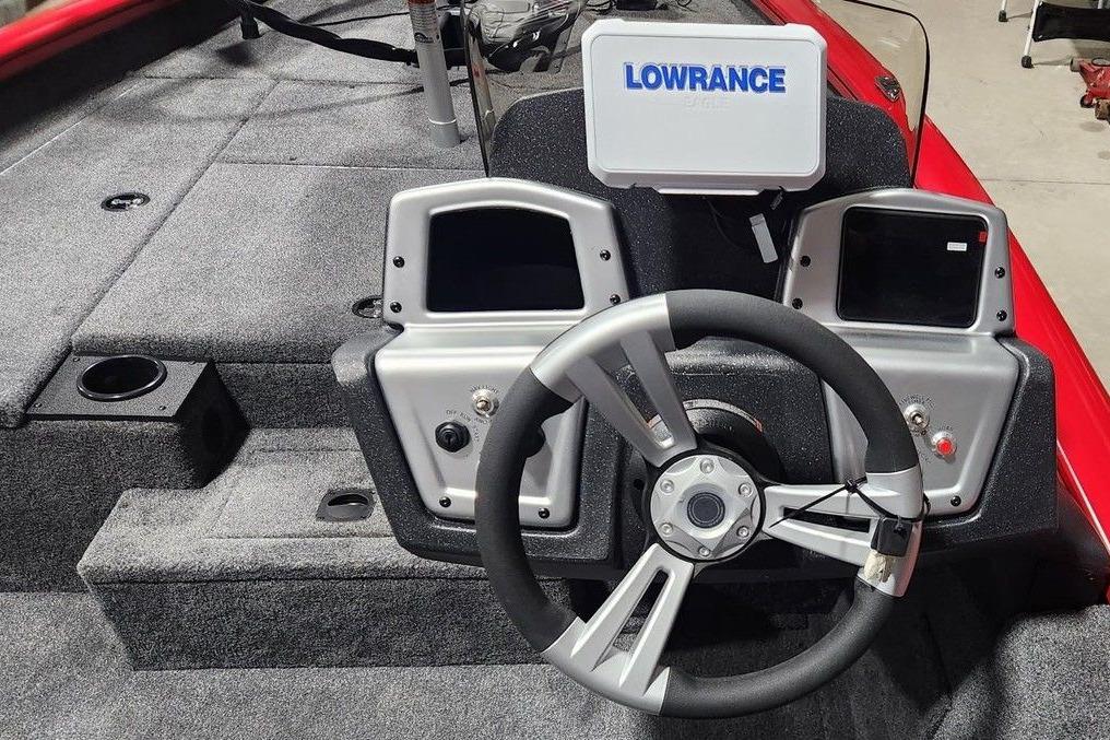 2026 Tracker Pro Team 175 boat dashboard with steering wheel and Lowrance electronics.