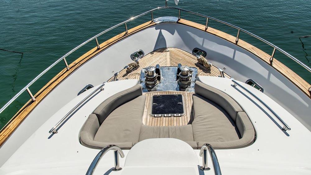 Luxurious 2007 Elegan Giant 28 yacht deck with seating and ocean view.