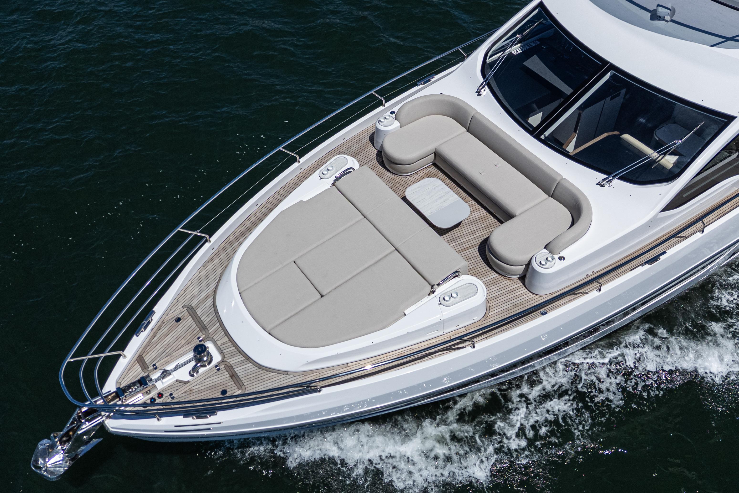 2026 Azimut Fly 72 yacht with elegant deck seating cruising on water.