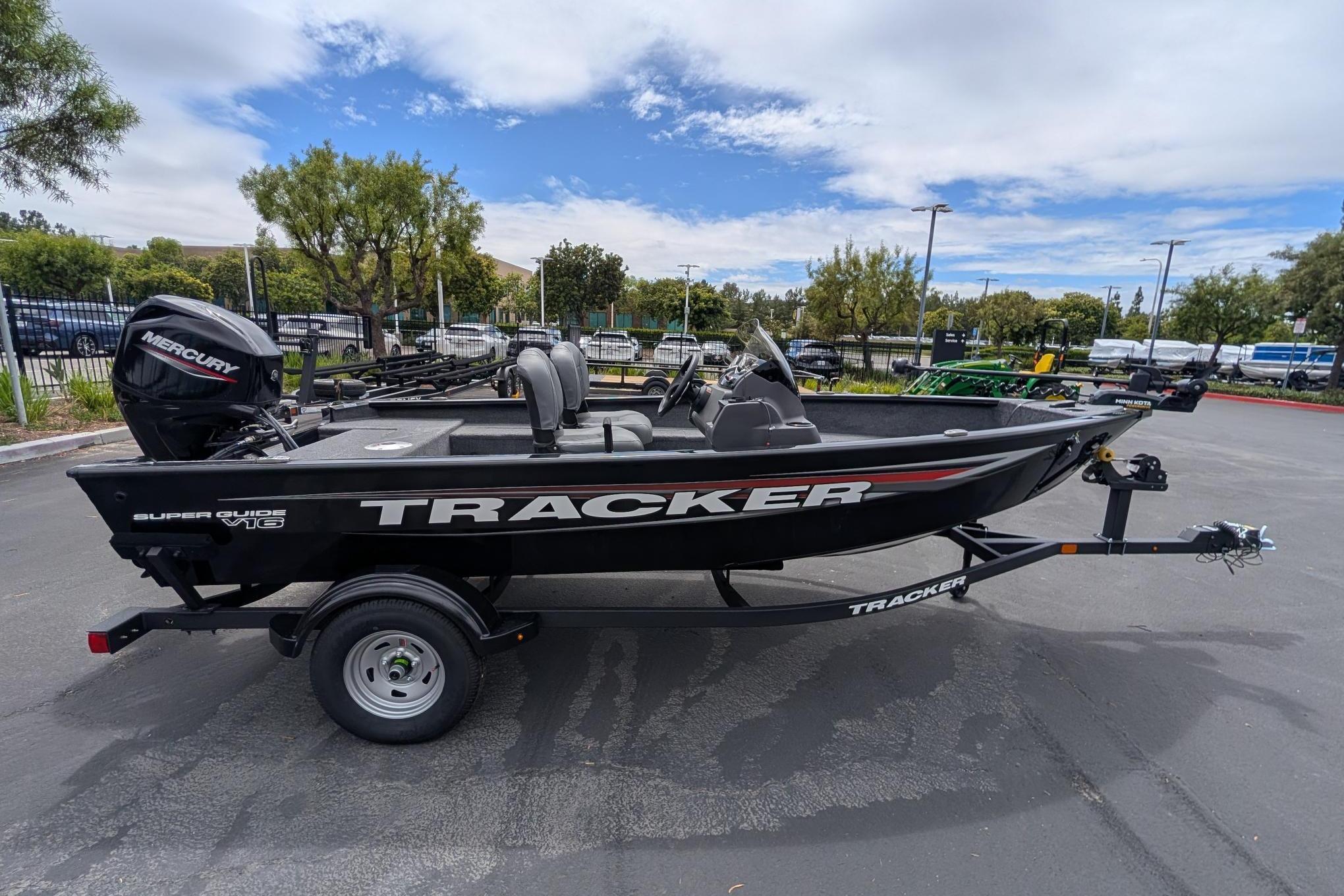 2026 Tracker Super Guide V-16 SC boat with Mercury engine on trailer.