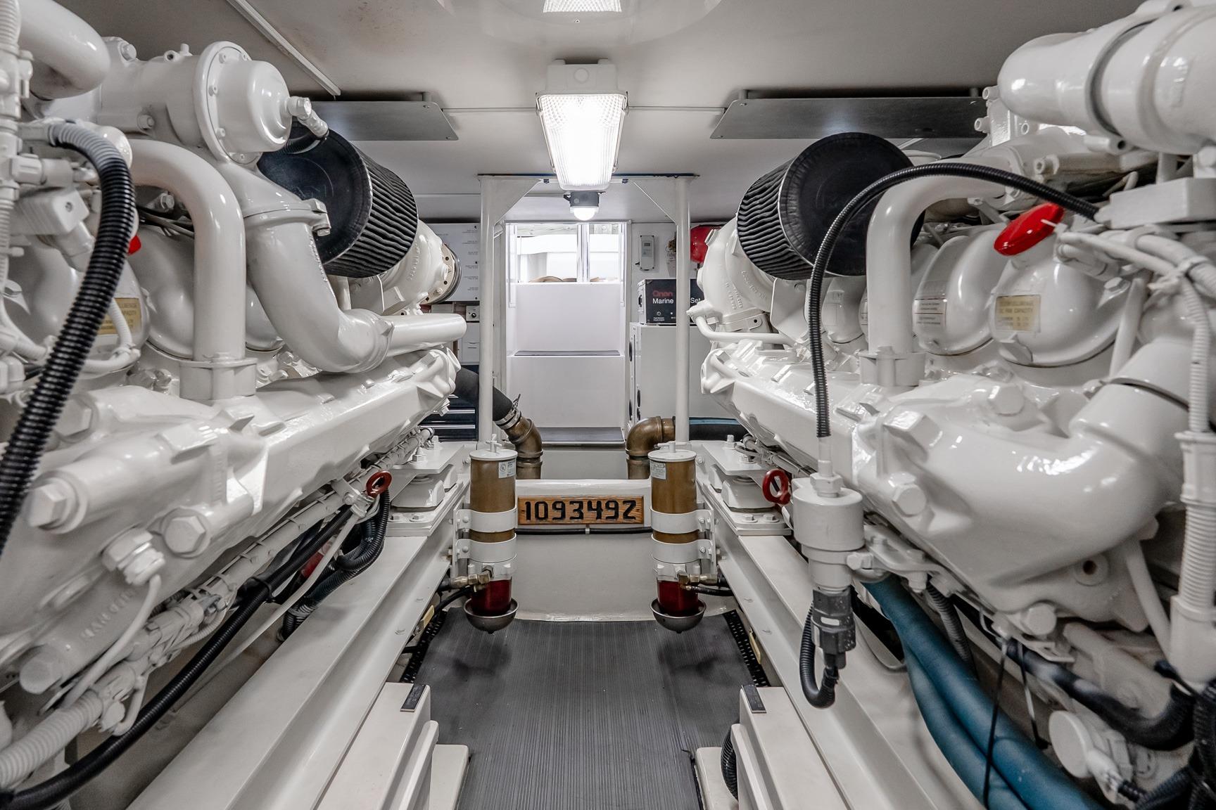 Engine room of a 2000 Viking 50' Convertible yacht, showcasing dual engines.