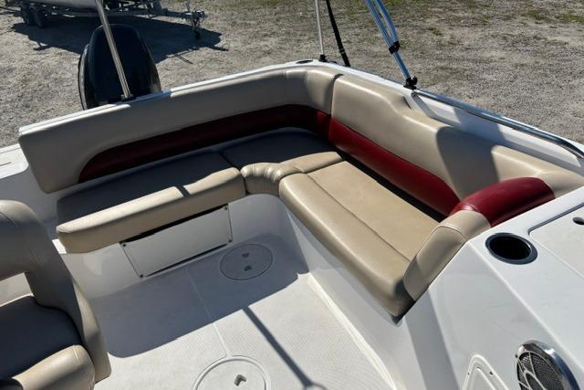 2016 Hurricane SunDeck Sport 188 OB boat interior with beige and red seating.