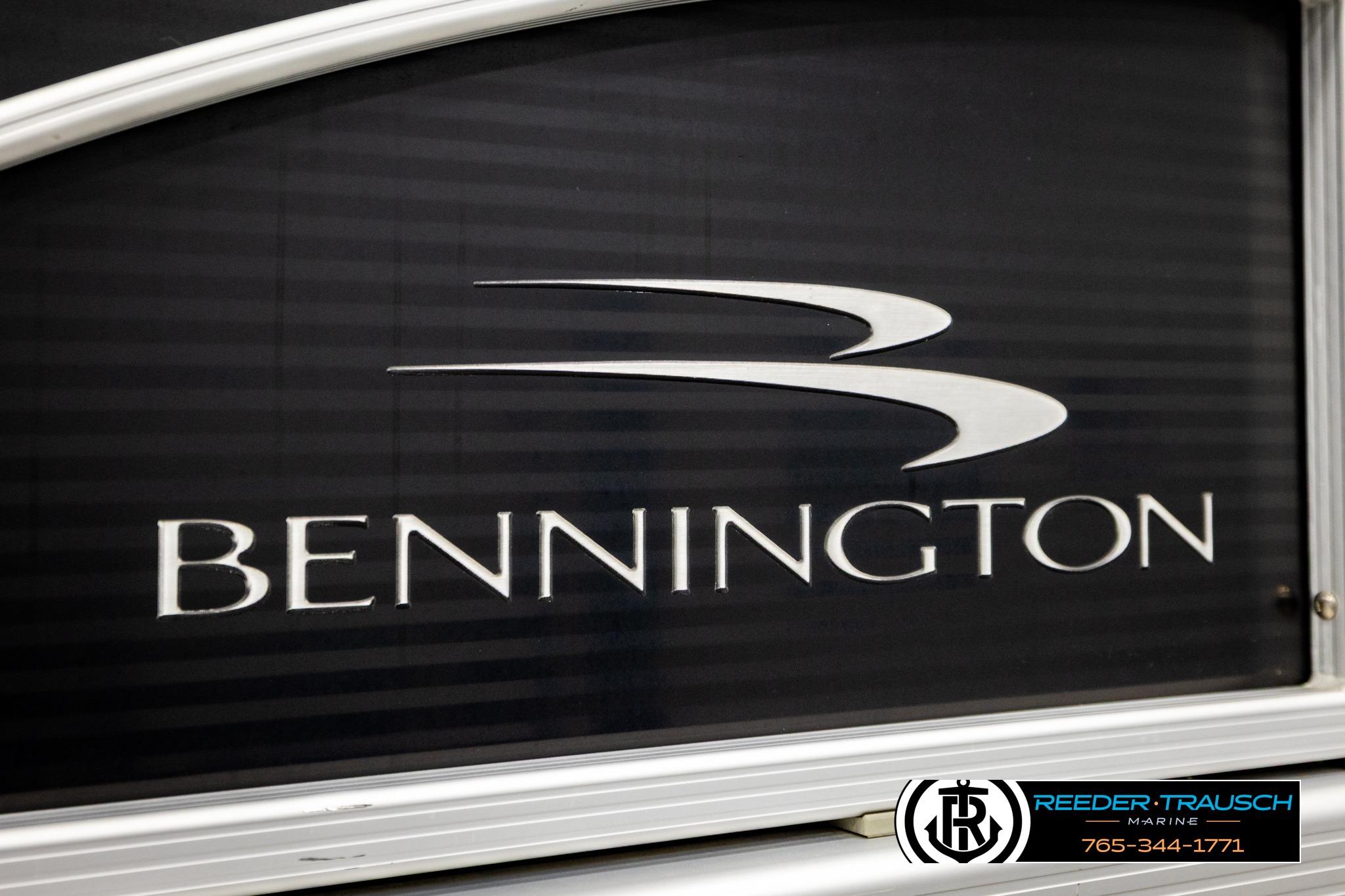 Bennington 20 SLMX 2013 logo on boat panel with Reeder-Trausch Marine contact details.