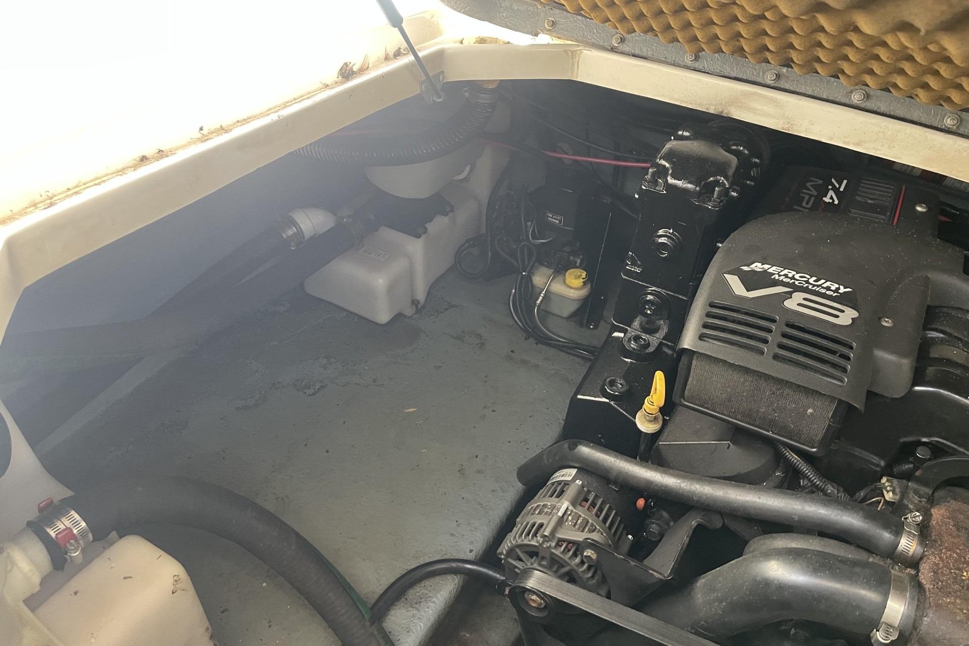 Engine compartment of a 2000 Sea Ray Sundancer 260 with Mercury Marine V8 engine.