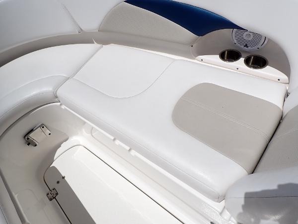 2011 Chaparral 287 SSX boat interior with white seating and cup holders.