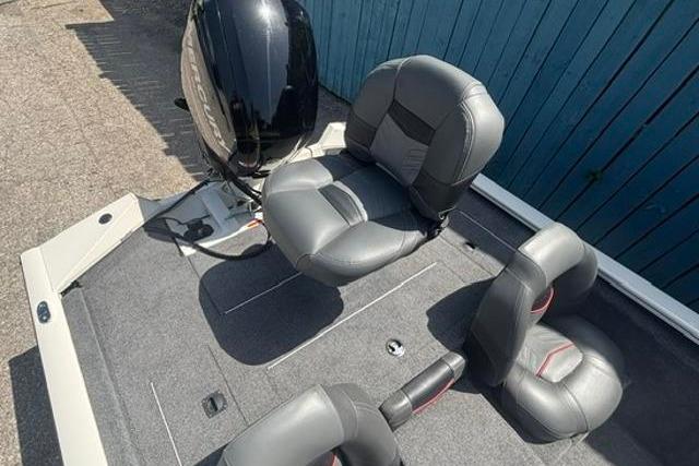 2021 Tracker Pro Team 175 TXW Tournament Edition boat interior with seating and motor.