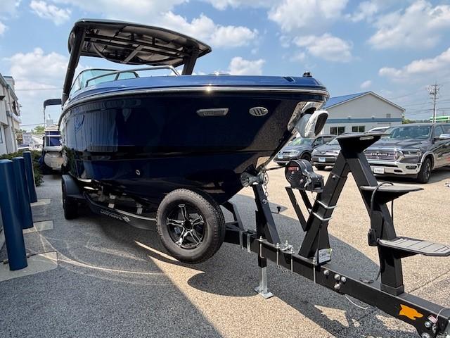 2026 Chaparral SSX 6 boat on trailer, parked outdoors under a clear sky.