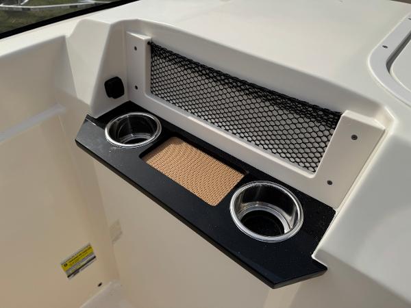 2025 Scout 215 Dorado boat console with cup holders and storage net.