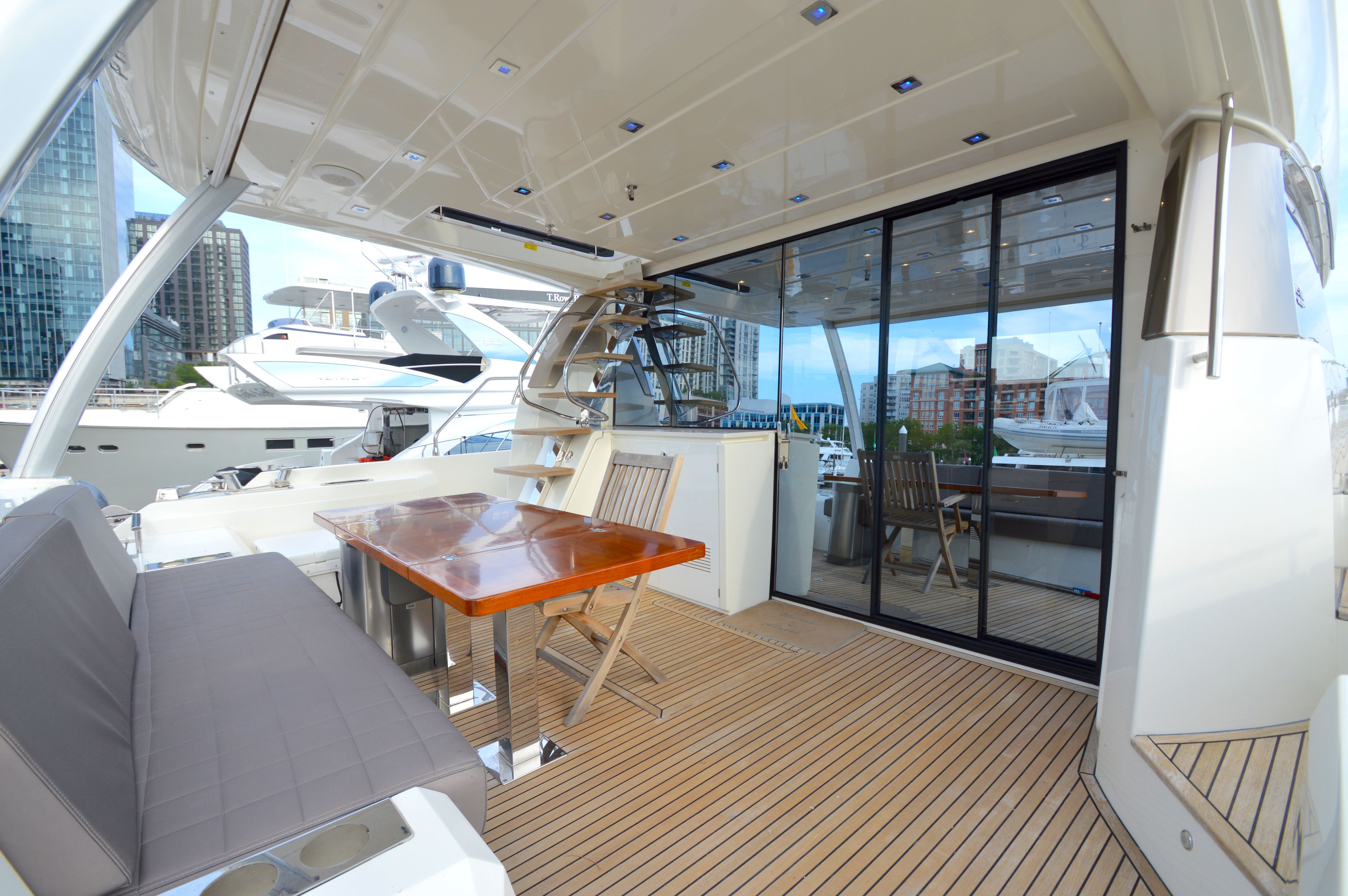Luxurious interior of a 2017 Prestige 630 yacht in the harbor.