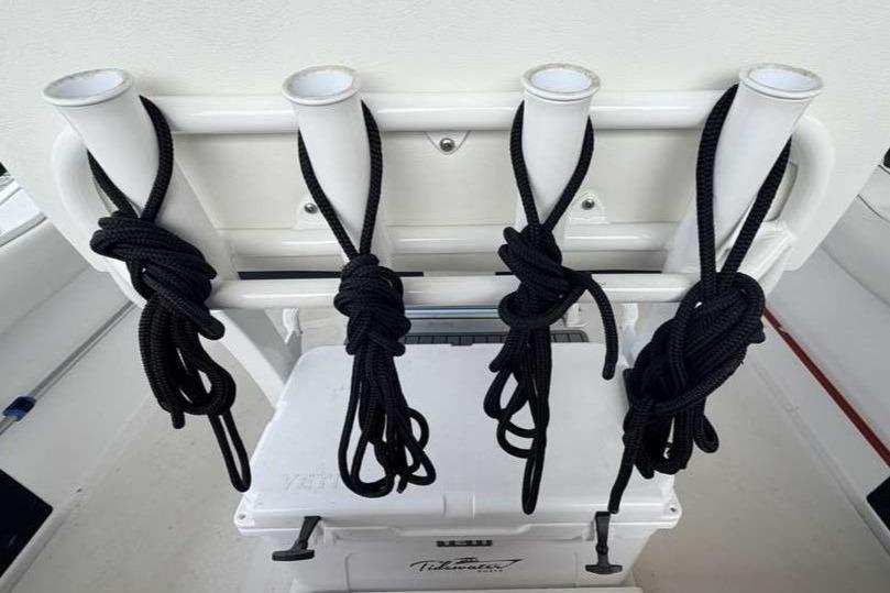 Rod holders and ropes on a 2024 Tidewater 232 LXF boat.