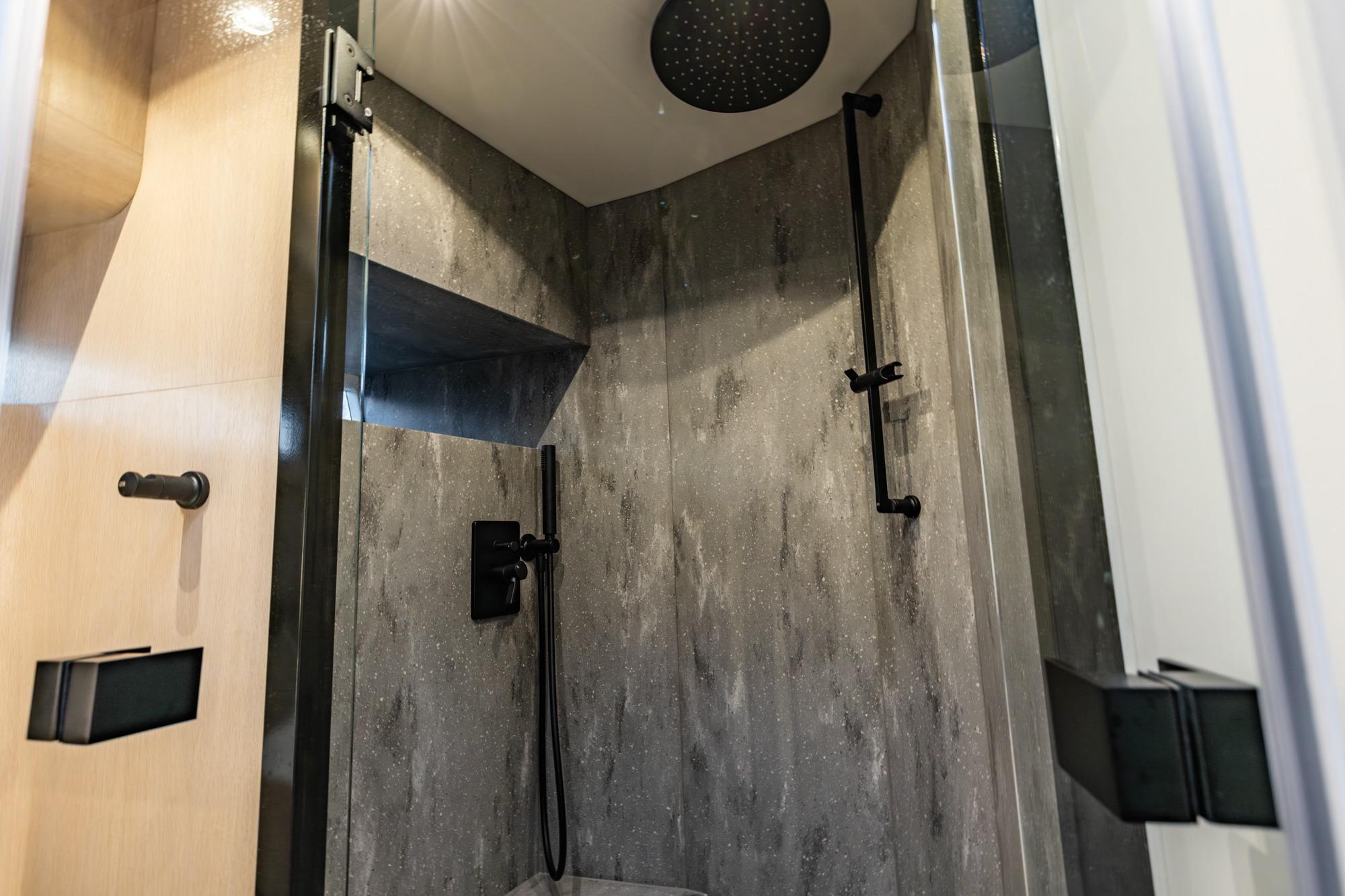 Luxurious shower interior in 2022 Steeler 56S Aluminium yacht, featuring modern fixtures and sleek design.